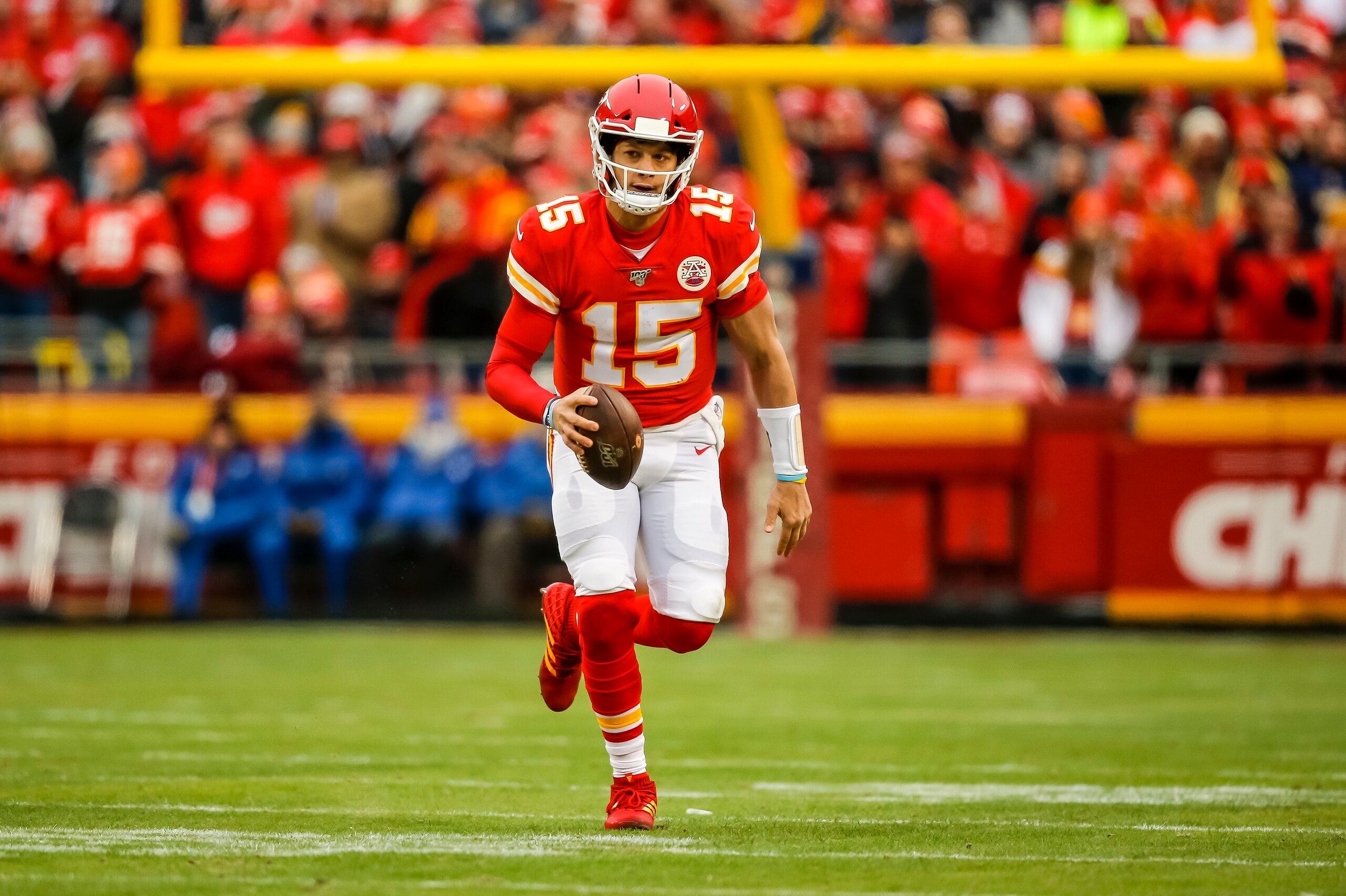 KANSAS CITY, MO - DECEMBER 29: Patrick Mahomes #15 of the Kansas City Chiefs scrambles to the sidelines during the second quarter against the Los Angeles Chargers at Arrowhead Stadium on December 29, 2019 in Kansas City, Missouri. (Photo by David Eulitt/G