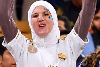 A Real Madrid supporter cheers ahead of the Spanish Super Cup semi final between Valencia and Real Madrid on January 8, 2020, at the King Abdullah Sport City in the Saudi Arabian port city of Jeddah. (Photo by GIUSEPPE CACACE / AFP) (Photo by GIUSEPPE CAC