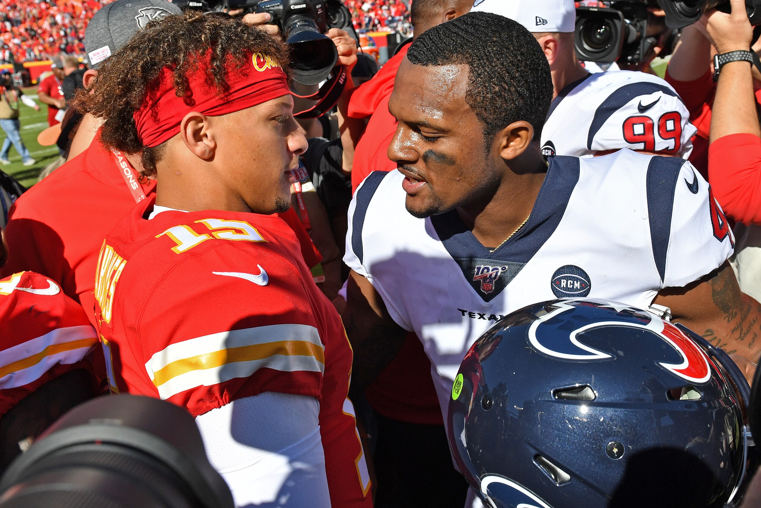 KANSAS CITY, MO - OCTOBER 13:  Quarterback Deshaun Watson #4 of the Houston Texans talks with quarterback Patrick Mahomes #15 of the Kansas City Chiefs after beating the Chiefs at Arrowhead Stadium on October 13, 2019 in Kansas City, Missouri. (Photo by P