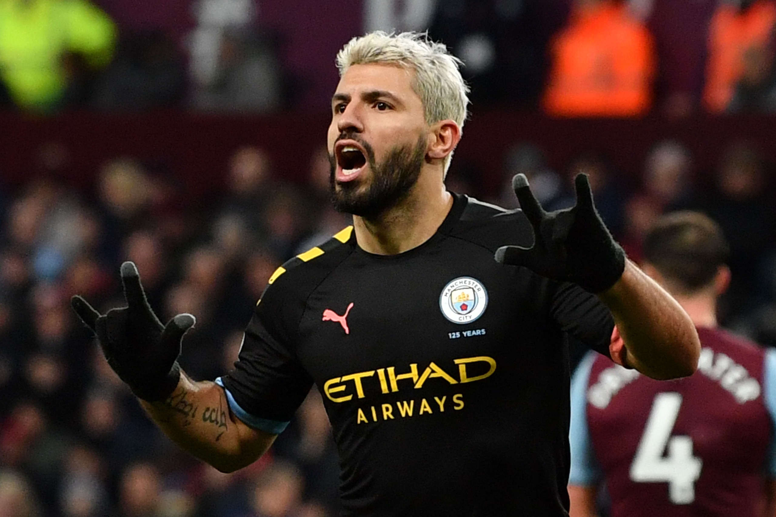 Manchester City's Argentinian striker Sergio Aguero celebrates scoring the fifth goal during the English Premier League football match between Aston Villa and Manchester City at Villa Park in Birmingham, central England on January 12, 2020. (Photo by Paul