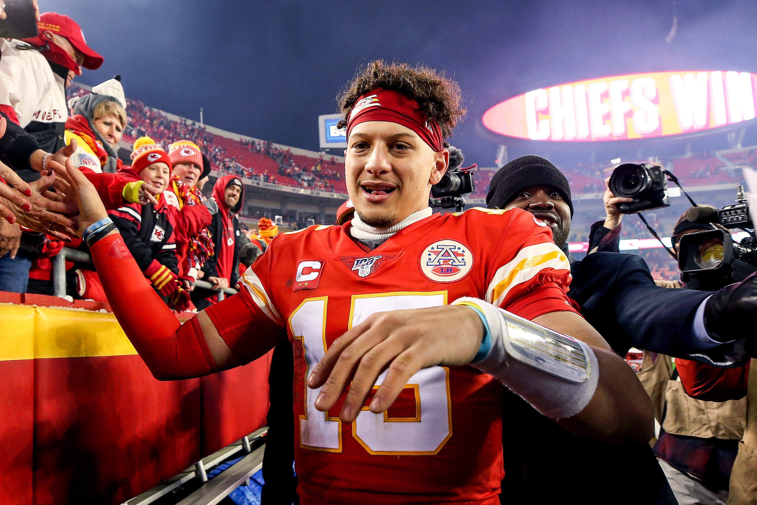 KANSAS CITY, MISSOURI - JANUARY 12:  Patrick Mahomes #15 of the Kansas City Chiefs celebrates his teams win against the Houston Texans in the AFC Divisional playoff game at Arrowhead Stadium on January 12, 2020 in Kansas City, Missouri. (Photo by Jamie Sq