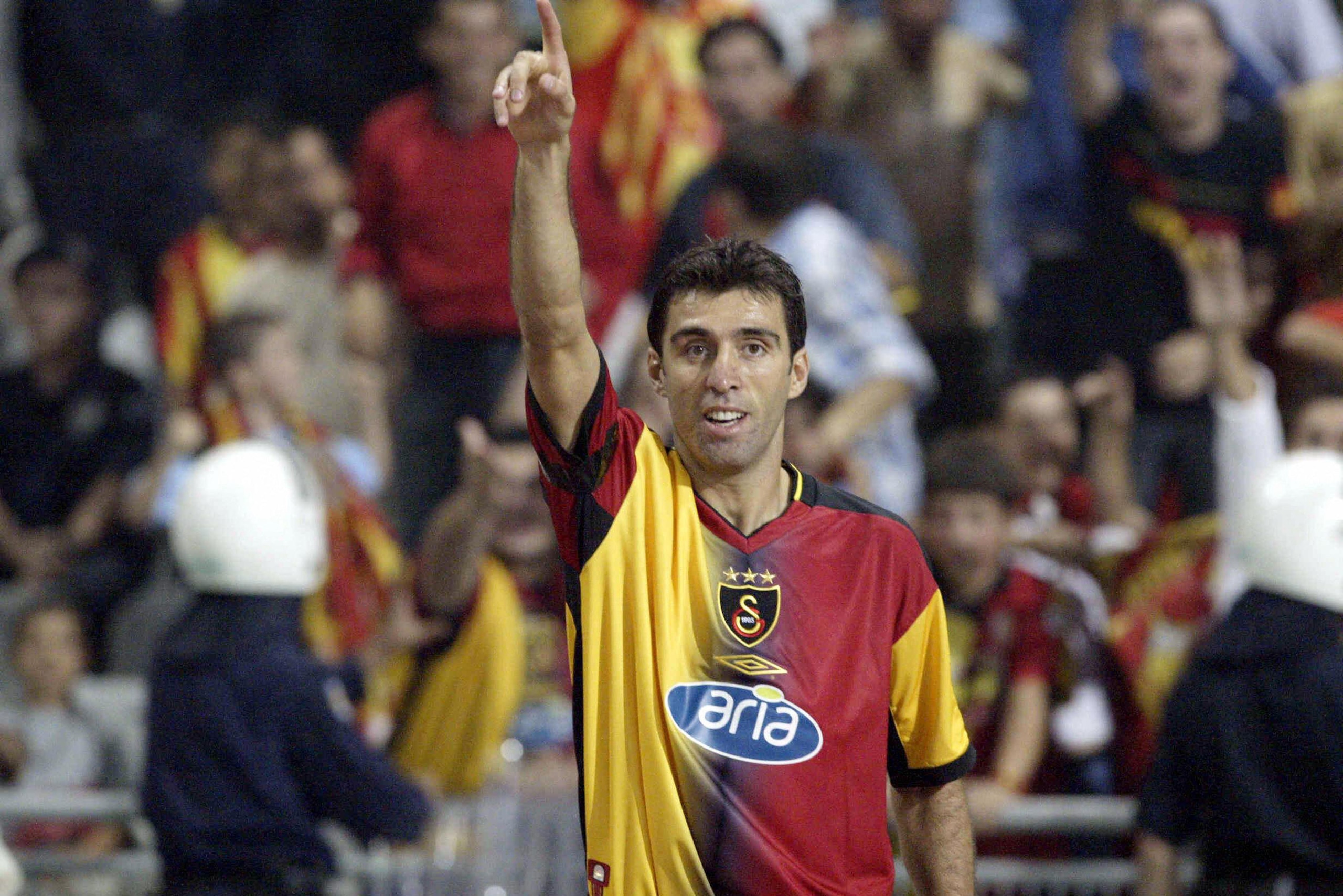 Galatasaray Istanbul`s scorer Hakan Sukur celebrates his goal which is Galatasaray`s second goal during the Europe Championship preliminary soccer game against CSKA Sofia in Olympic stadium, 13 August 2003, Istanbul.  AFP PHOTO/ Mustafa Ozer  (Photo credi