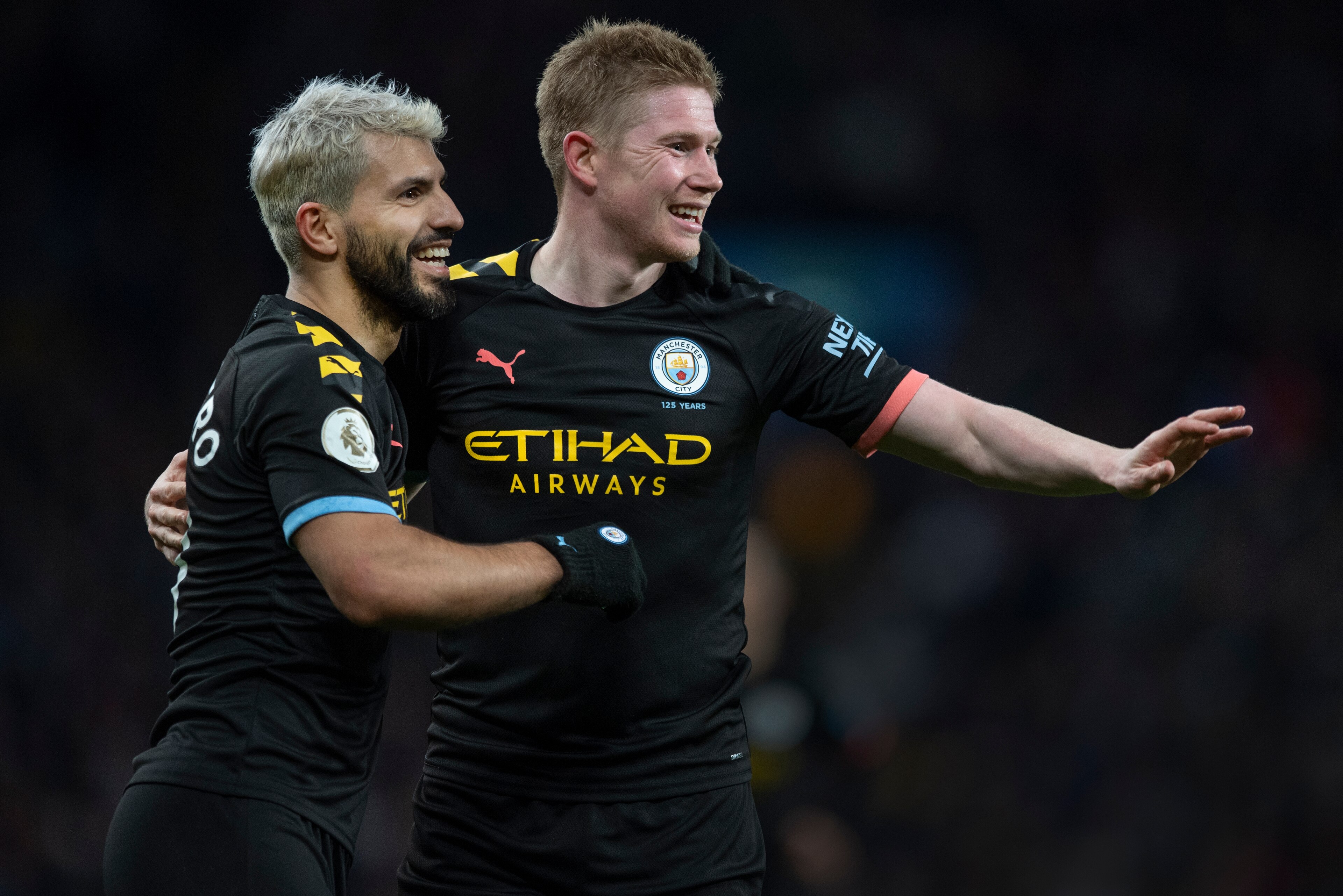 BIRMINGHAM, ENGLAND - JANUARY 12: Sergio Aguero of Manchester City celebrates scoring his second goal of a hat trick with team mate Kevin De Bruyne during the Premier League match between Aston Villa and Manchester City at Villa Park on January 12, 2020 i