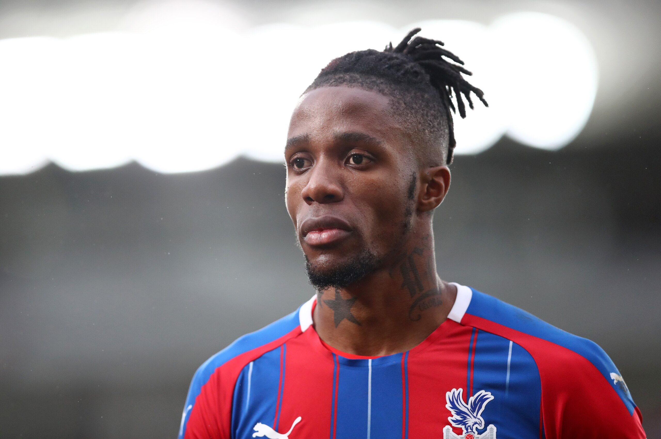 LONDON, ENGLAND - JANUARY 11: Wilfried Zaha of Crystal Palace looks on during the Premier League match between Crystal Palace and Arsenal FC at Selhurst Park on January 11, 2020 in London, United Kingdom. (Photo by Dan Istitene/Getty Images)
