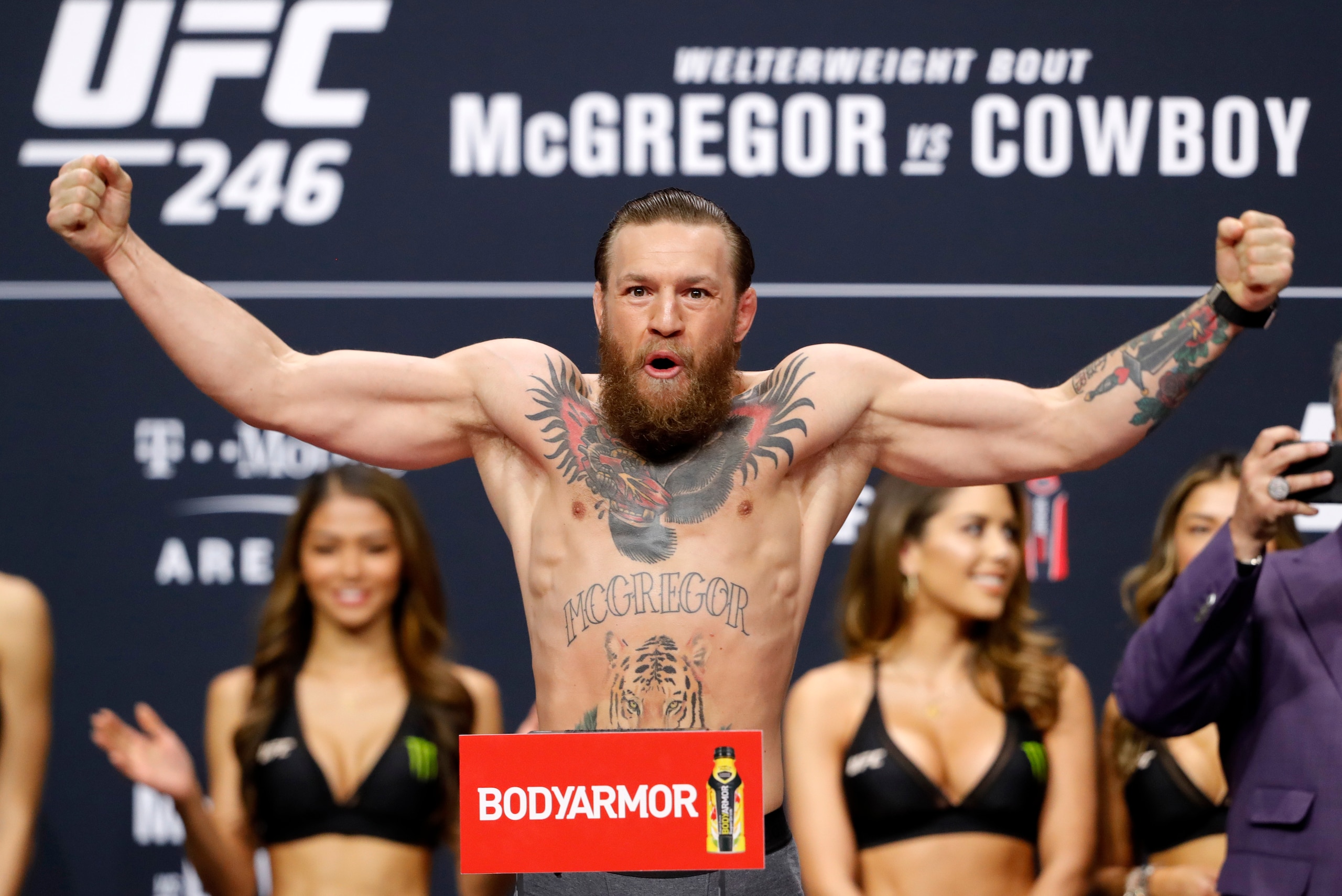 LAS VEGAS, NEVADA - JANUARY 17:  Welterweight fighter Conor McGregor poses on the scale during a ceremonial weigh-in for UFC 246 at Park Theater at Park MGM on January 17, 2020 in Las Vegas, Nevada. McGregor will face Donald Cerrone at UFC 246 on January 