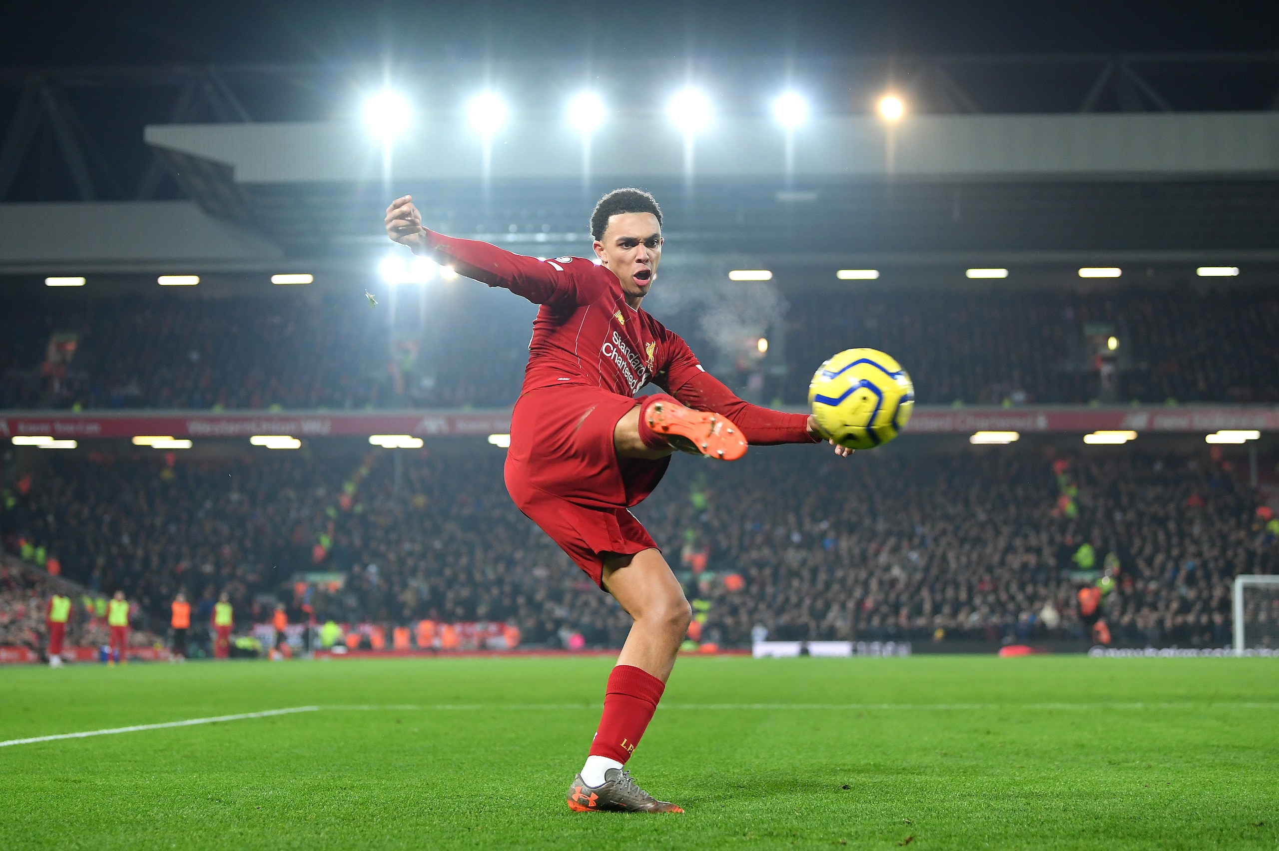 LIVERPOOL, ENGLAND - JANUARY 19: Trent Alexander-Arnold of Liverpool crosses the ball during the Premier League match between Liverpool FC and Manchester United at Anfield on January 19, 2020 in Liverpool, United Kingdom. (Photo by Michael Regan/Getty Ima