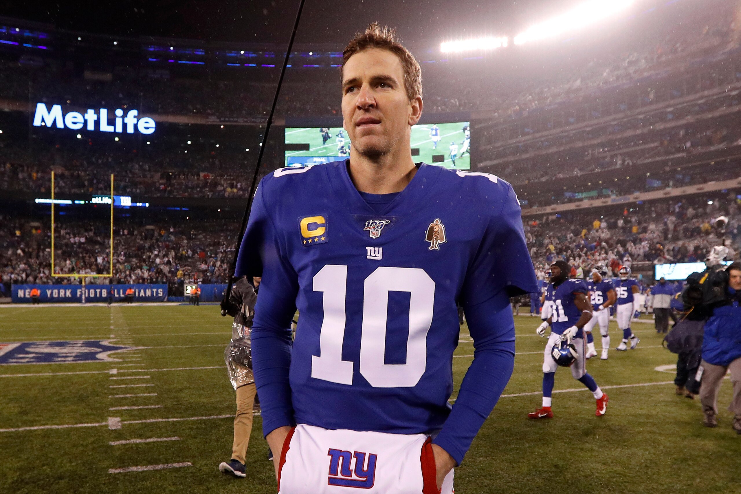 EAST RUTHERFORD, NEW JERSEY - DECEMBER 29:  (NEW YORK DAILIES OUT)   Eli Manning #10 of the New York Giants walks on the field after a game against the Philadelphia Eagles at MetLife Stadium on December 29, 2019 in East Rutherford, New Jersey. The Eagles 