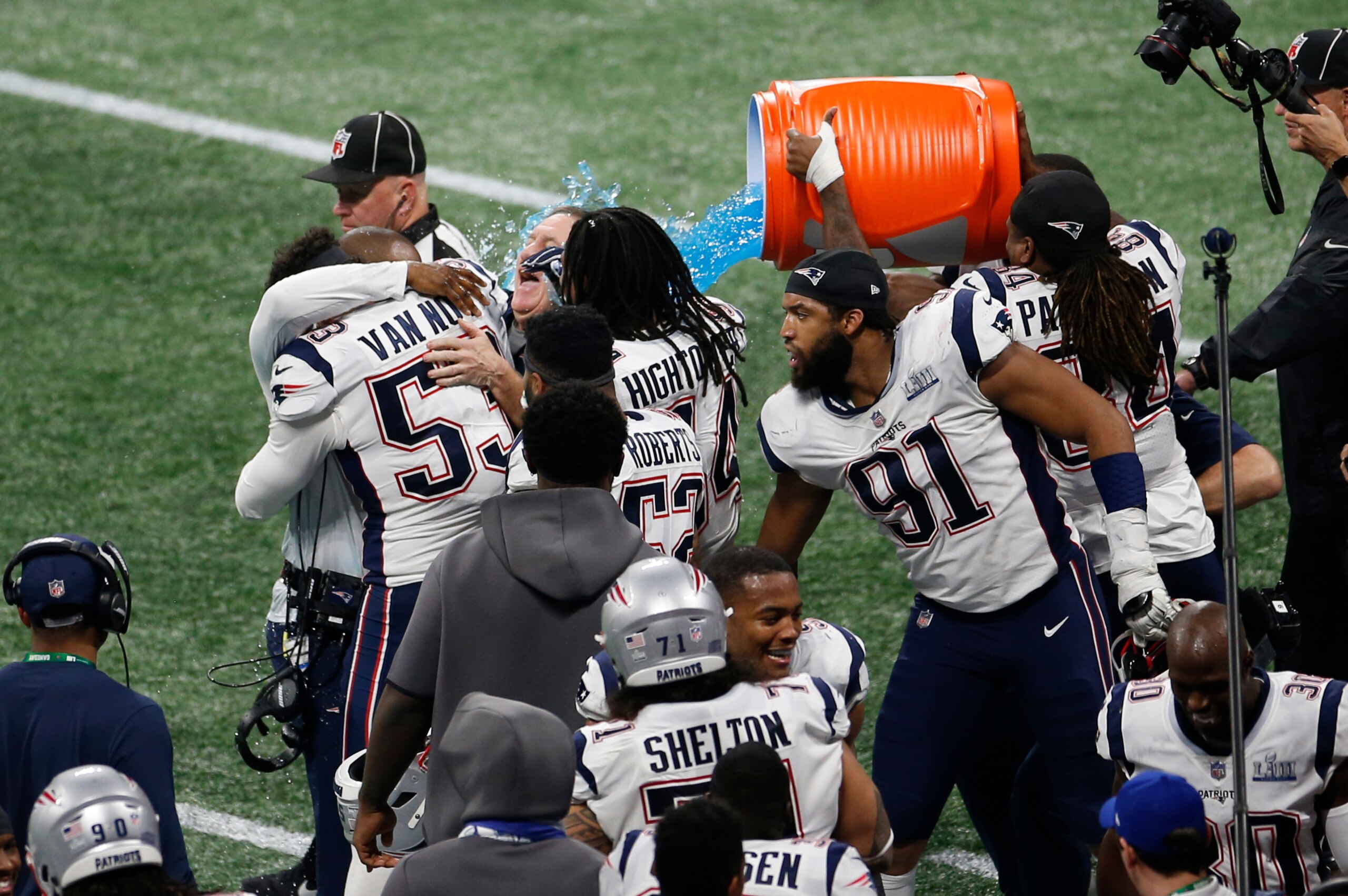 ATLANTA, GEORGIA - FEBRUARY 03: Head Coach Bill Belichick of the New England Patriots gets a Gatorade bath on the sideline during Super Bowl LIII against the Los Angeles Rams at Mercedes-Benz Stadium on February 03, 2019 in Atlanta, Georgia. (Photo by Mic