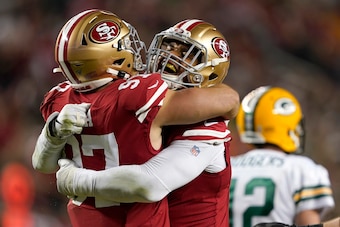 Arik Armstead and Nick Bosa celebrate a big stop in the NFC Championship Game