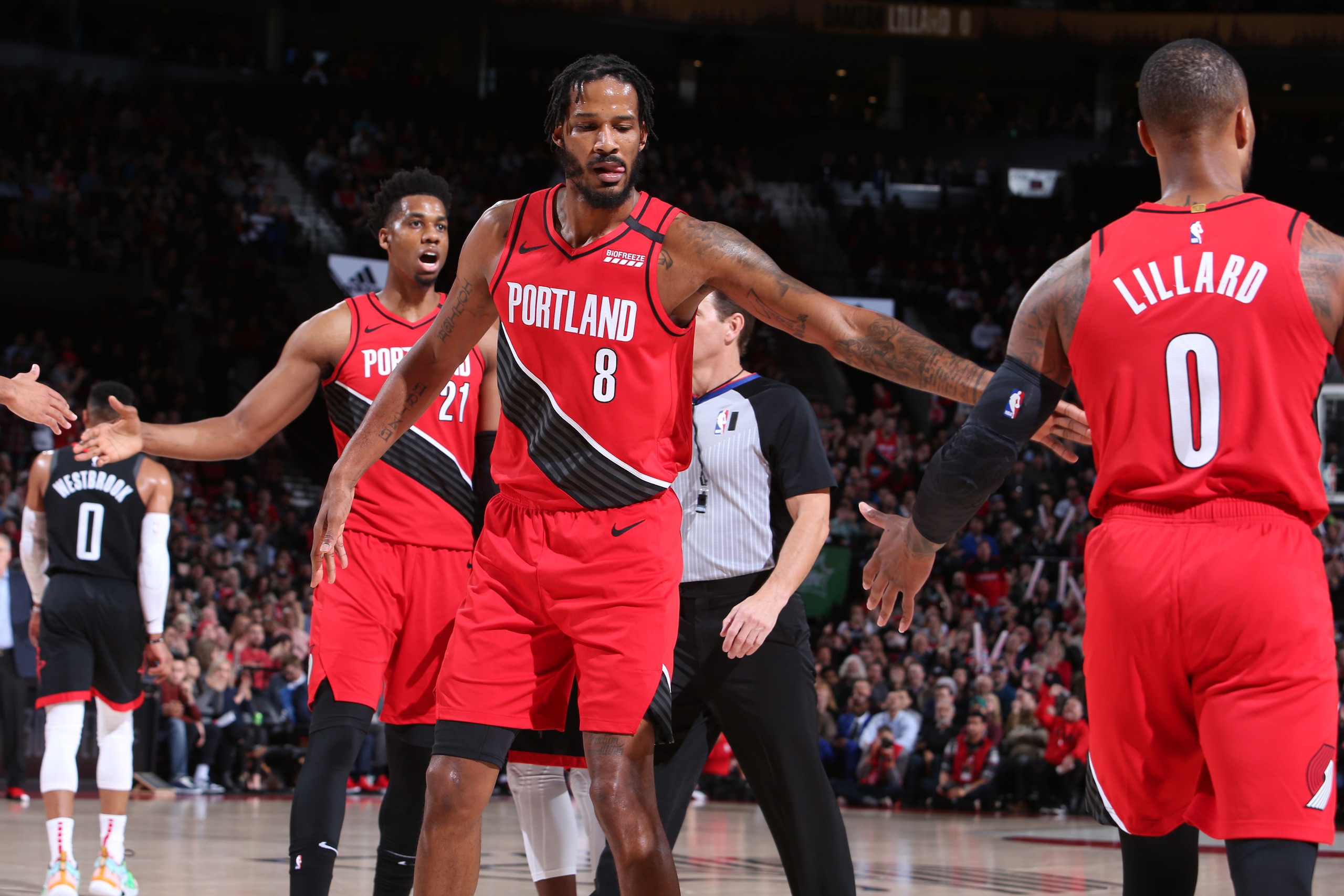 PORTLAND, OR - JANUARY 29: Trevor Ariza #8 and Damian Lillard #0 of the Portland Trail Blazers hi-five during the game against the Houston Rockets on January 29, 2020 at the Moda Center Arena in Portland, Oregon. NOTE TO USER: User expressly acknowledges 