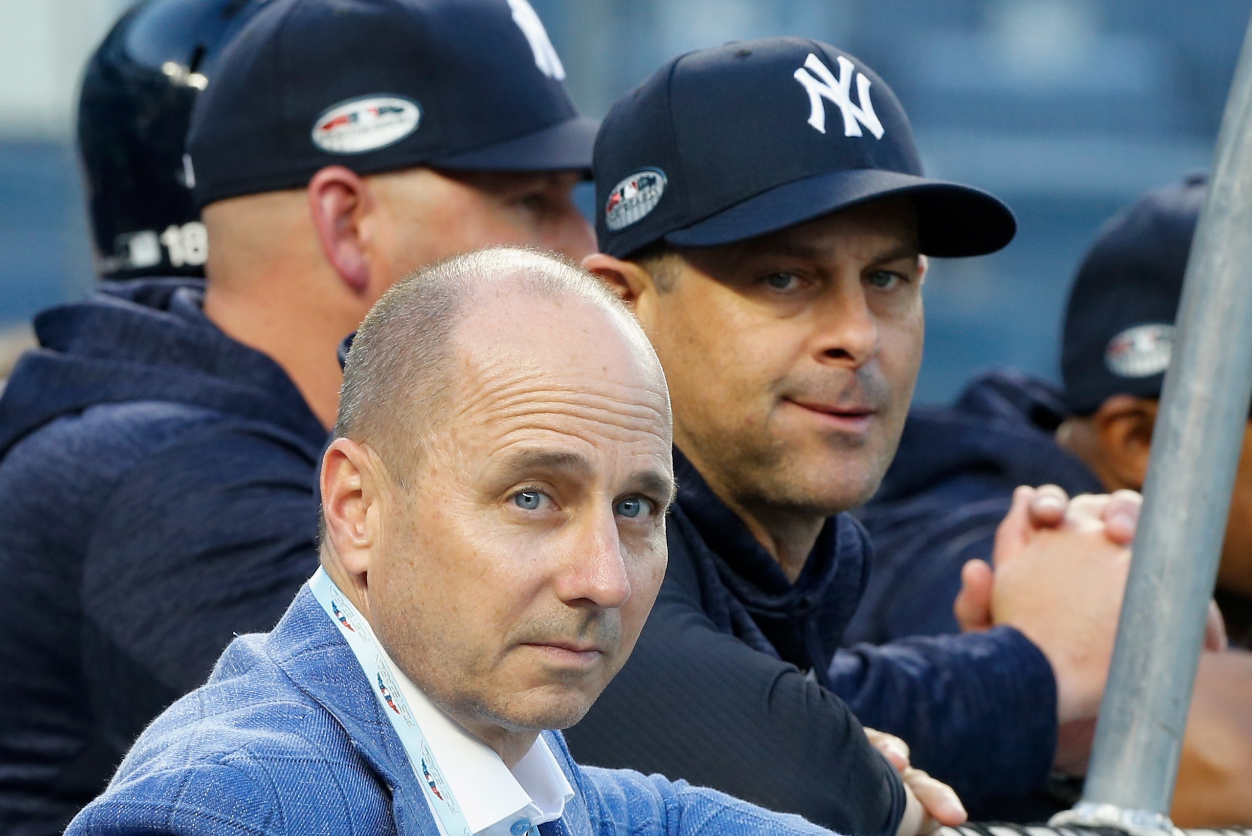 NEW YORK, NY - OCTOBER 09:  (NEW YORK DAILIES OUT)   General Manager Brian Cashman and Manager Aaron Boone #17 of the New York Yankees during batting practice before Game Four of the American League Division Series against the Boston Red Sox at Yankee Sta