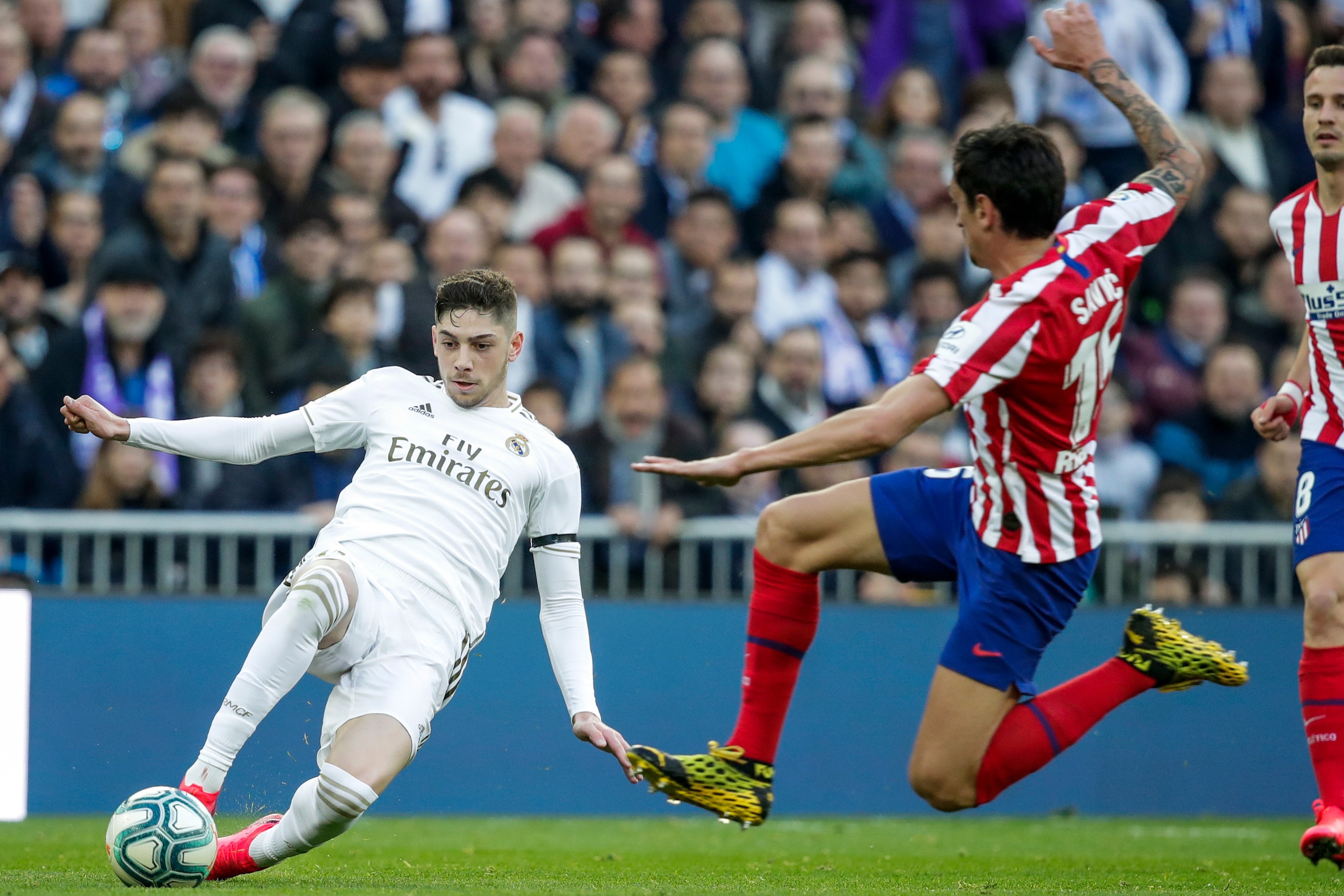 MADRID, SPAIN - FEBRUARY 1: (L-R) Fede Valverde of Real Madrid, Stefan Savic of Atletico Madrid during the La Liga Santander match between Real Madrid v Atletico Madrid at the Santiago Bernabeu on February 1, 2020 in Madrid Spain (Photo by David S. Busta MADRID, SPAIN - FEBRUARY 1: (L-R) Fede Valverde of Real Madrid, Stefan Savic of Atletico Madrid during the La Liga Santander match between Real Madrid v Atletico Madrid at the Santiago Bernabeu on February 1, 2020 in Madrid Spain (Photo by David S. Busta