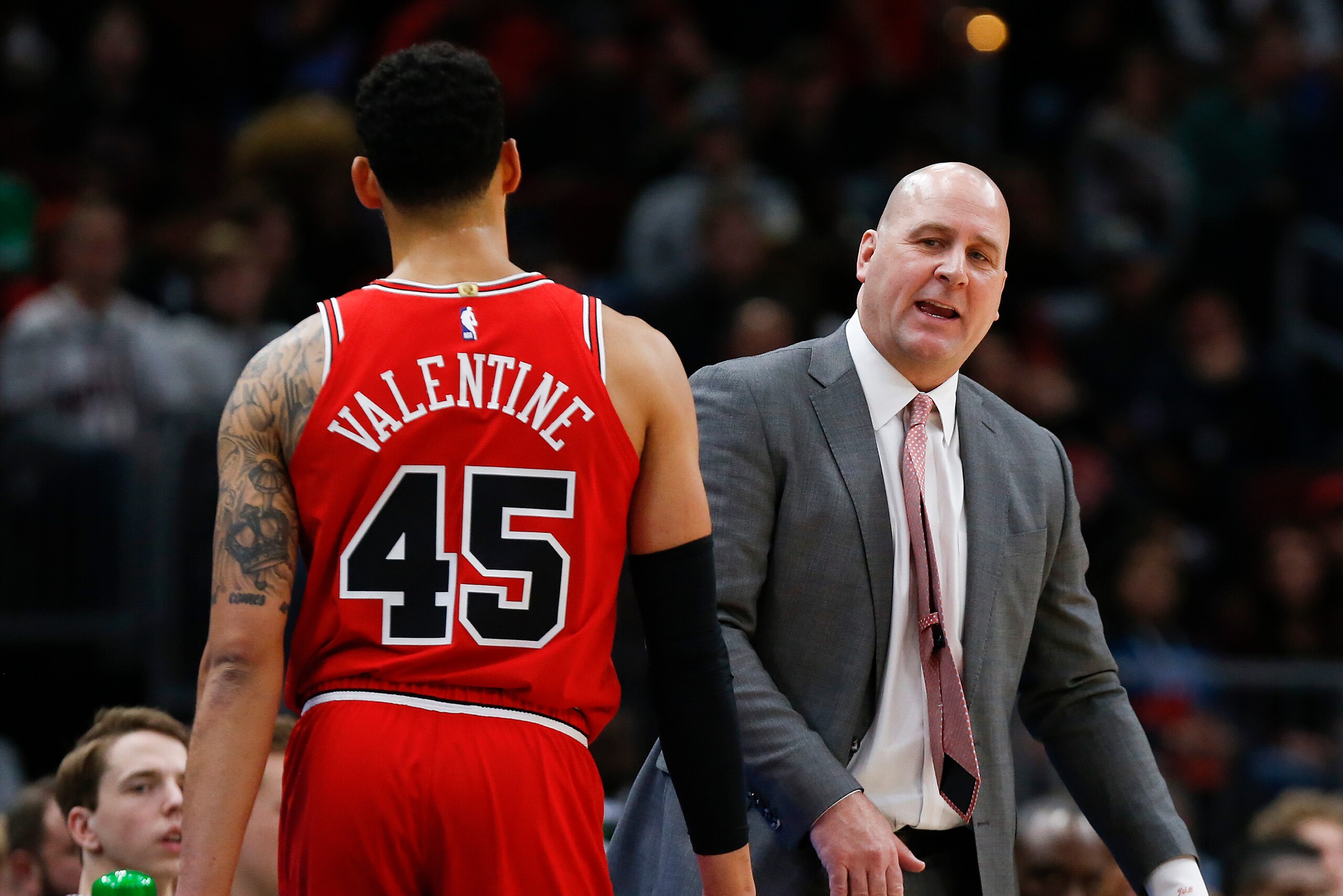 CHICAGO, ILLINOIS - JANUARY 02: Head coach Jim Boylen of the Chicago Bulls with Denzel Valentine #45 during the game against the Utah Jazz at United Center on January 02, 2020 in Chicago, Illinois. NOTE TO USER: User expressly acknowledges and agrees that