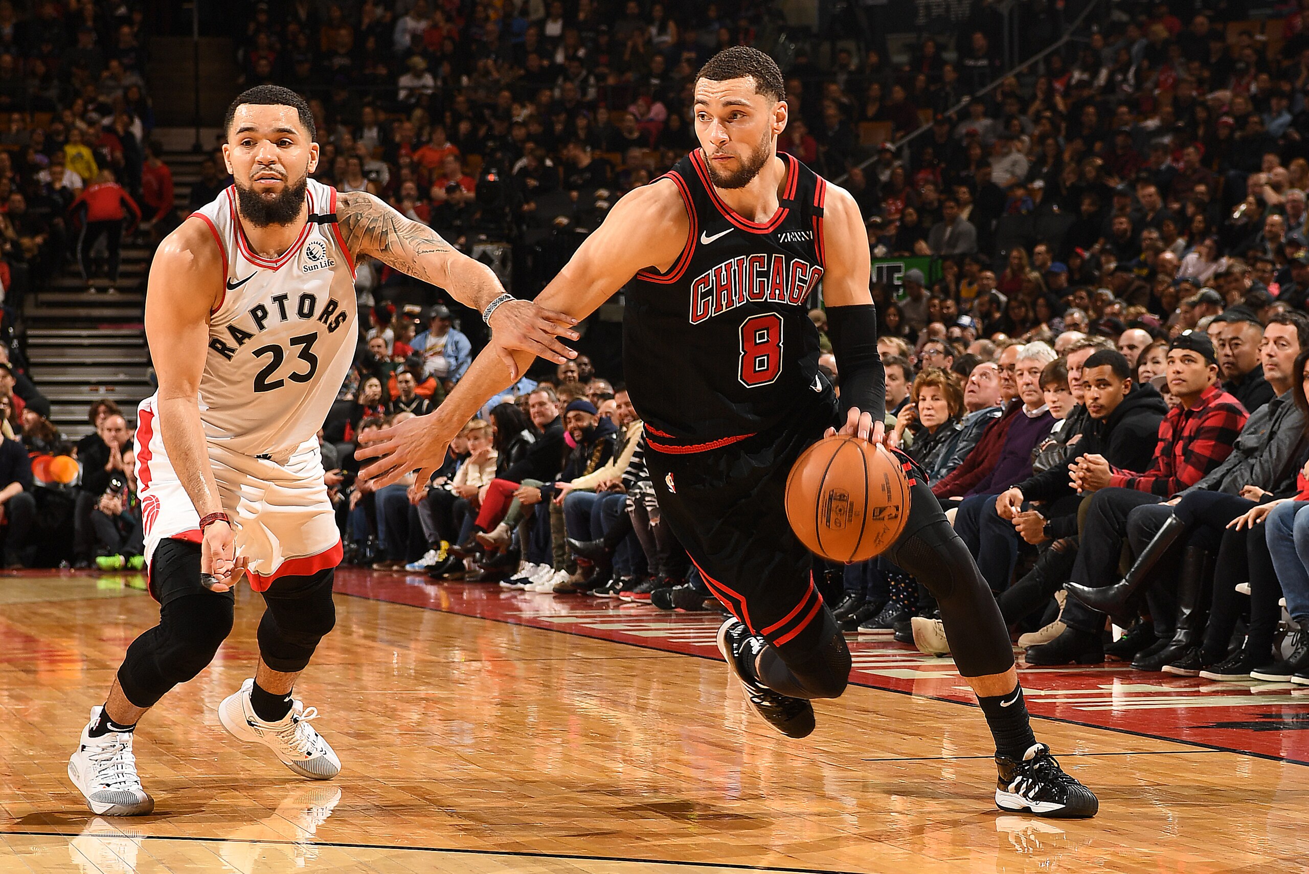 TORONTO, CANADA - FEBRUARY 2: Zach LaVine #8 of the Chicago Bulls handles the ball against Fred VanVleet #23 of the Toronto Raptors on February 3, 2020 at the Scotiabank Arena in Toronto, Ontario, Canada.  NOTE TO USER: User expressly acknowledges and agr