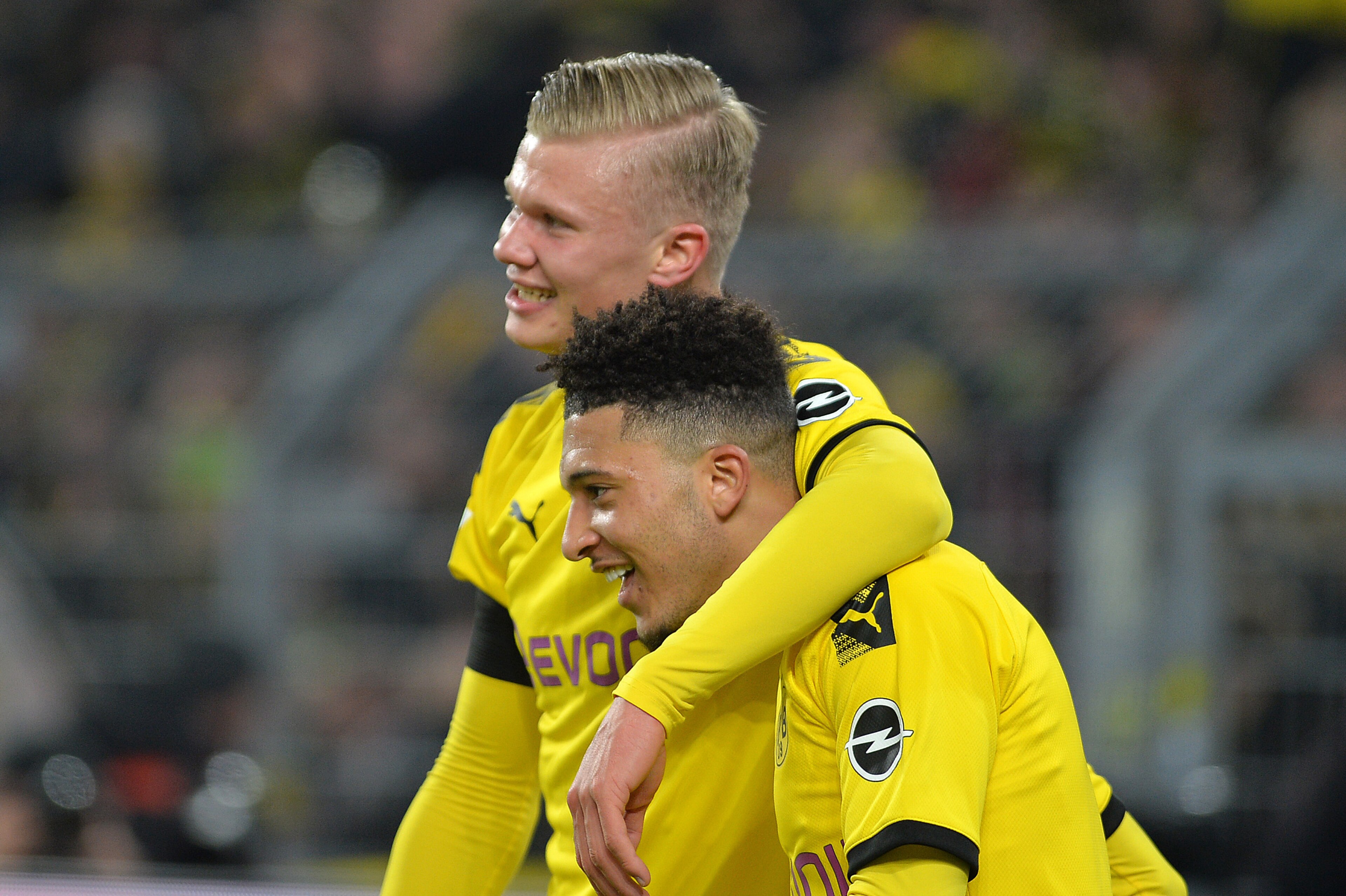 DORTMUND, GERMANY - JANUARY 24: (BILD ZEITUNG OUT) Erling Braut Haaland of Borussia Dortmund and Jadon Sancho of Borussia Dortmund celebrates after scoring his teams fifth goal with the team mates during the Bundesliga match between Borussia Dortmund and DORTMUND, GERMANY - JANUARY 24: (BILD ZEITUNG OUT) Erling Braut Haaland of Borussia Dortmund and Jadon Sancho of Borussia Dortmund celebrates after scoring his teams fifth goal with the team mates during the Bundesliga match between Borussia Dortmund and