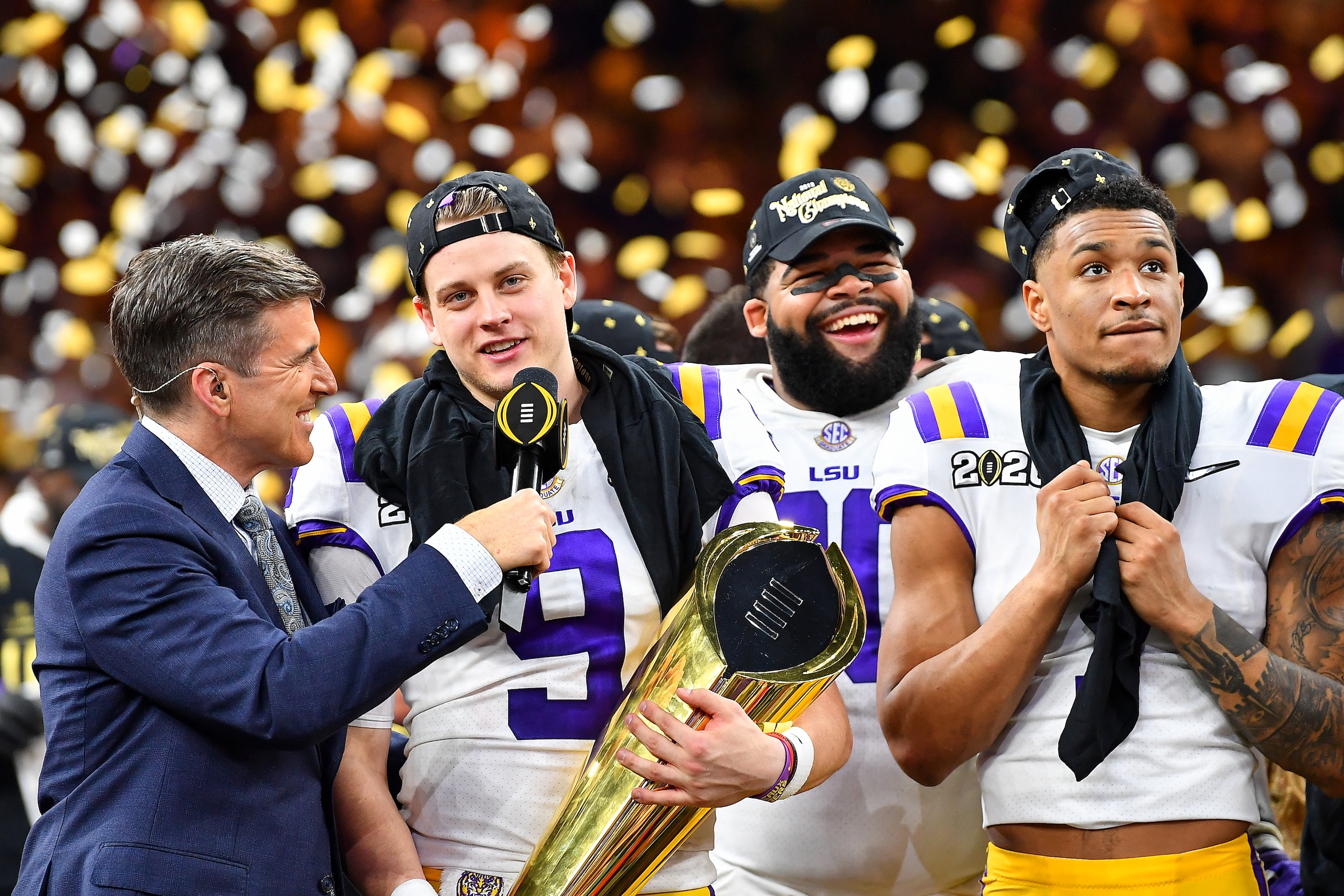 NEW ORLEANS, LOUISIANA - JANUARY 13: Joe Burrow #9 of the LSU Tigers is all smiles during an interview by ESPN's Rece Davis after the College Football Playoff National Championship game against the Clemson Tigers at the Mercedes Benz Superdome on January 