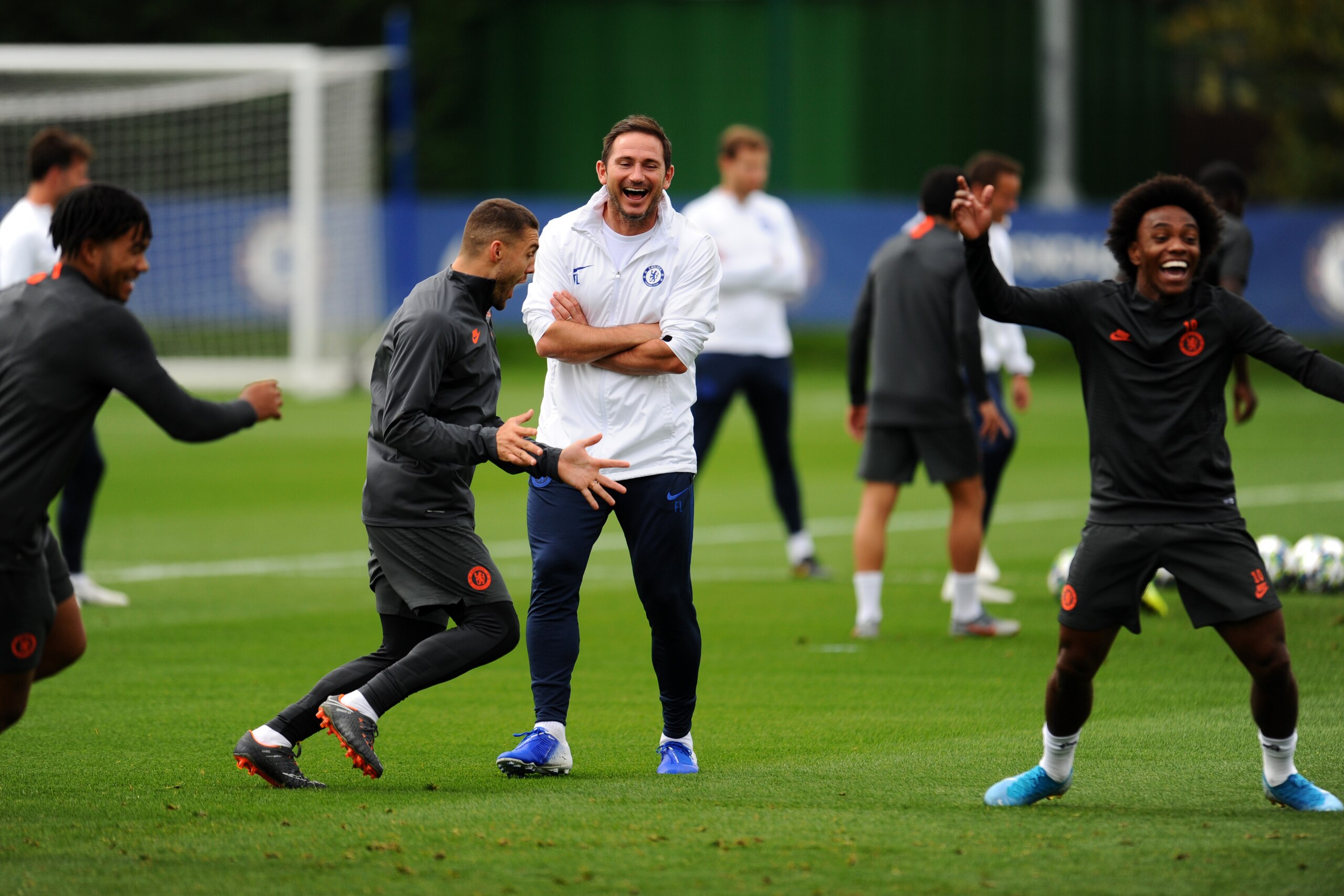 COBHAM, ENGLAND - SEPTEMBER 16: Frank Lampard, Manager of Chelsea and Mateo Kovacic of Chelsea react during the Chelsea FC training session on the eve of the UEFA Champions League match between Chelsea FC and Valencia CF at Chelsea Training Ground on Sept