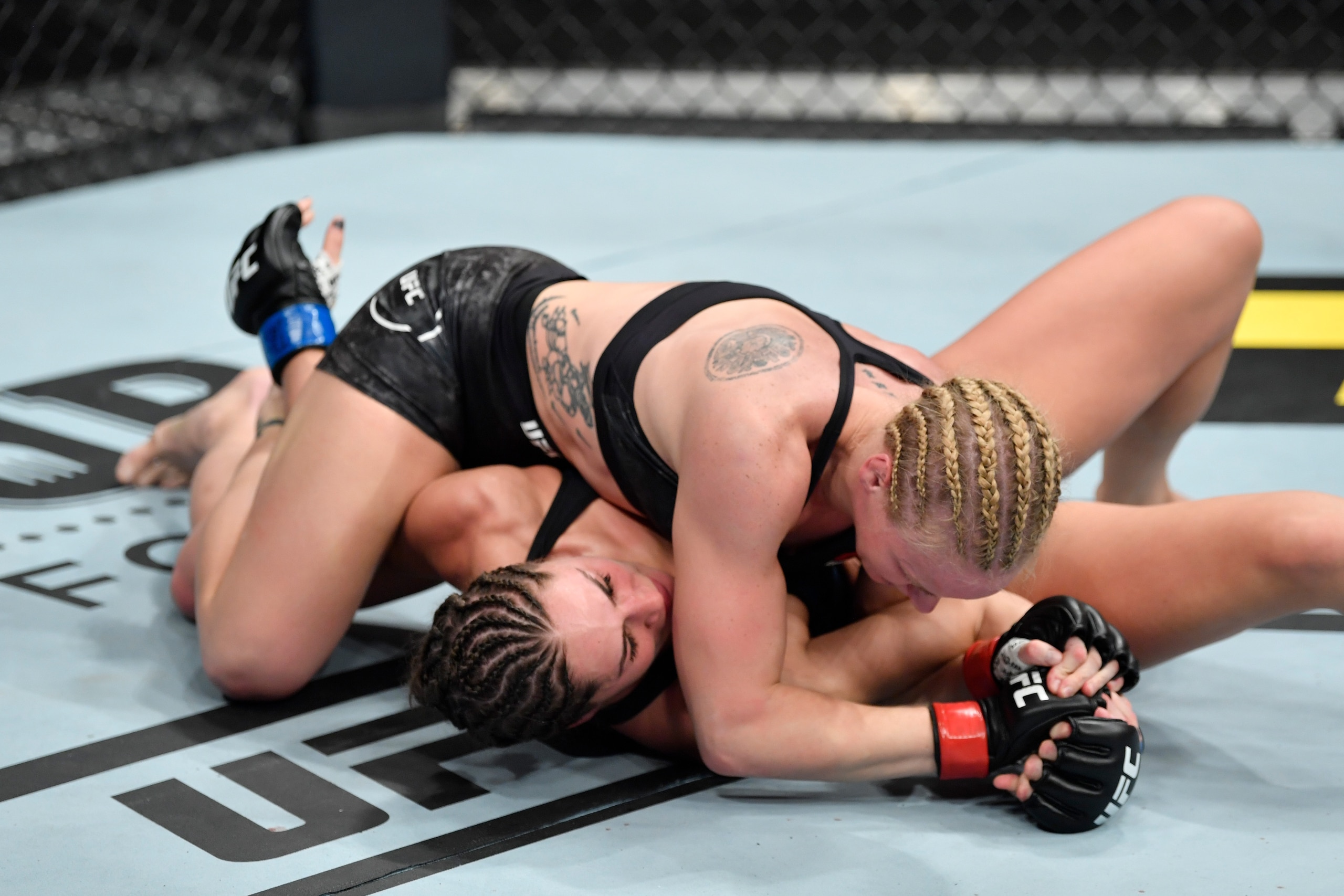 CHICAGO, IL - JUNE 08:  (L-R) Valentina Shevchenko of Kyrgyzstan grapples Jessica Eye in their women's flyweight championship bout during the UFC 238 event at the United Center on June 8, 2019 in Chicago, Illinois. (Photo by Jeff Bottari/Zuffa LLC/Zuffa L