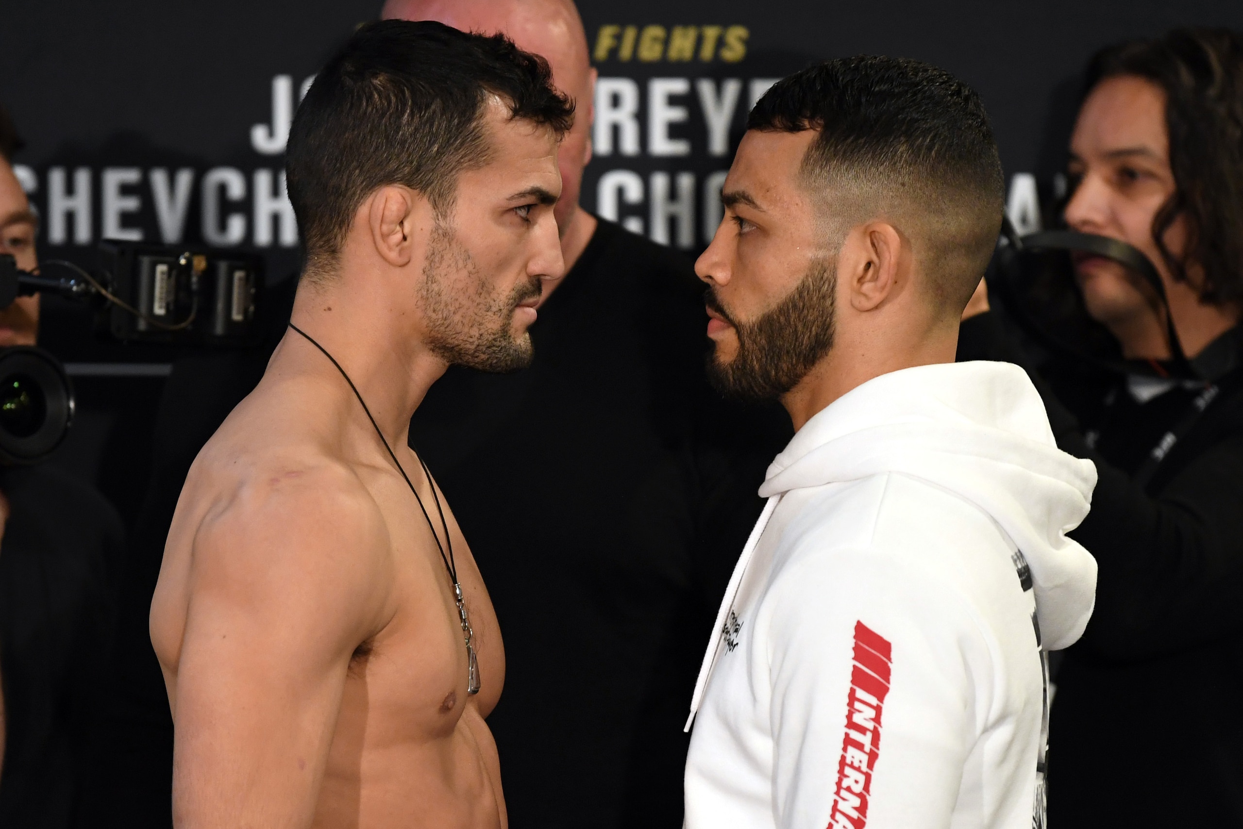 HOUSTON, TEXAS - FEBRUARY 06: (L-R) Opponents Mirsad Bektic and Dan Ige face off during the UFC 247 Ultimate Media Day at the Crowne Plaza Houston River Oaks on February 06, 2020 in Houston, Texas. (Photo by Josh Hedges/Zuffa LLC)