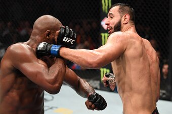 HOUSTON, TEXAS - FEBRUARY 08:  (R-L) Dominick Reyes punches Jon Jones in their light heavyweight championship bout during the UFC 247 event at Toyota Center on February 08, 2020 in Houston, Texas. (Photo by Josh Hedges/Zuffa LLC via Getty Images)