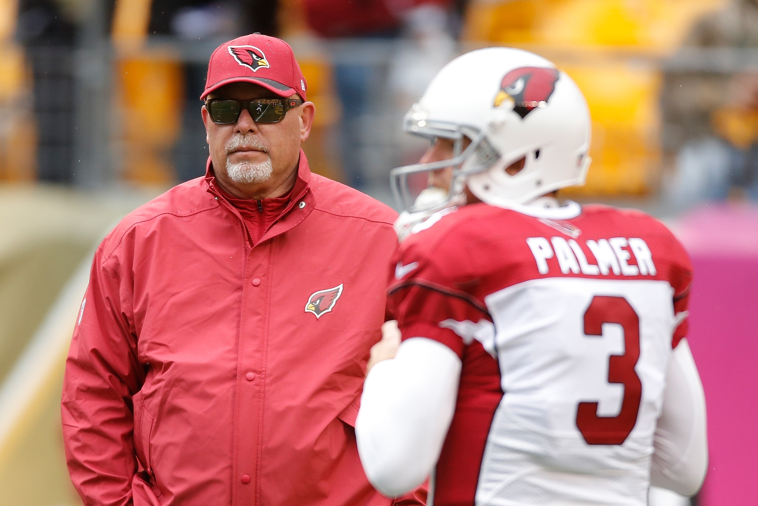 PITTSBURGH, PA - OCTOBER 18:  Head Coach Bruce Arians of the of the Arizona Cardinals and Carson Palmer #3 look on before the game against the Pittsburgh Steelers at Heinz Field on October 18, 2015 in Pittsburgh, Pennsylvania.  (Photo by Gregory Shamus/Ge