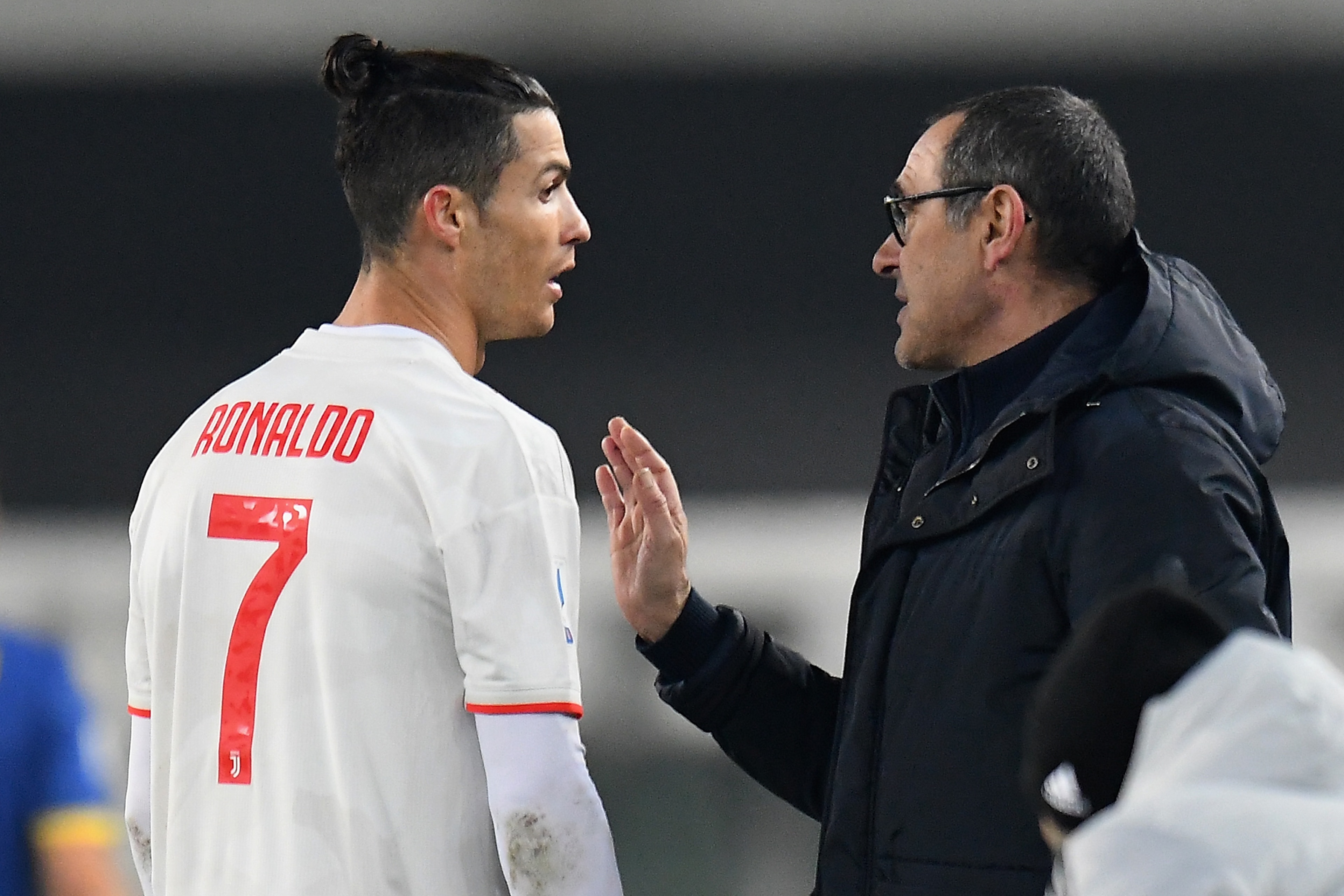 VERONA, ITALY - FEBRUARY 08: Maurizio Sarri head coach of Juventus issues instructions to Cristiano Ronaldo of Juventus during the Serie A match between Hellas Verona and Juventus at Stadio Marcantonio Bentegodi on February 8, 2020 in Verona, Italy. ( VERONA, ITALY - FEBRUARY 08: Maurizio Sarri head coach of Juventus issues instructions to Cristiano Ronaldo of Juventus during the Serie A match between Hellas Verona and Juventus at Stadio Marcantonio Bentegodi on February 8, 2020 in Verona, Italy. (