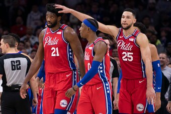 PHILADELPHIA, PA - FEBRUARY 11: Joel Embiid #21, Josh Richardson #0, and Ben Simmons #25 of the Philadelphia 76ers react against the Los Angeles Clippers at the Wells Fargo Center on February 11, 2020 in Philadelphia, Pennsylvania. The 76ers defeated the 