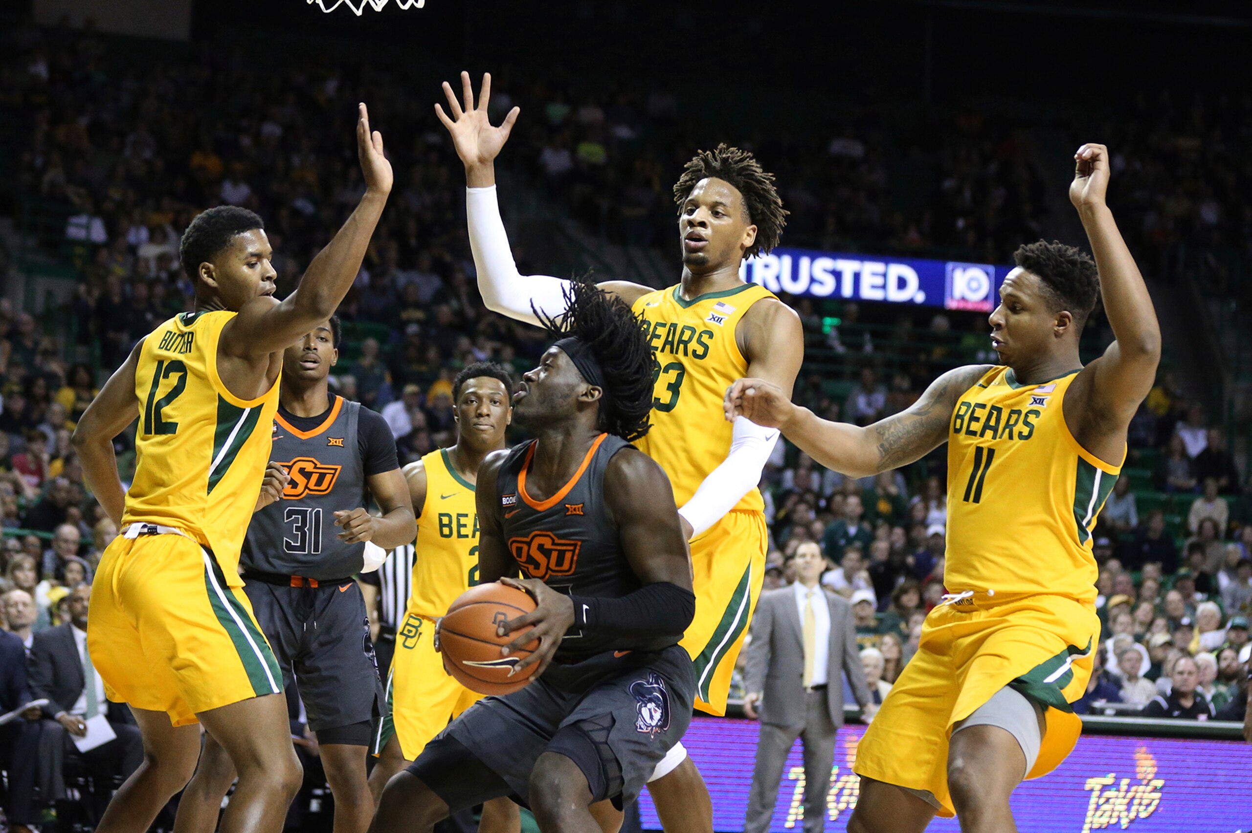 A swarm of Baylor defenders ready to swat away an Oklahoma State field-goal attempt