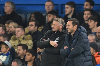 Manchester United's Norwegian manager Ole Gunnar Solskjaer (L) and Chelsea's English head coach Frank Lampard gesture during the English League Cup fourth round football match between Chelsea and Manchester United at Stamford Bridge in London on October 3
