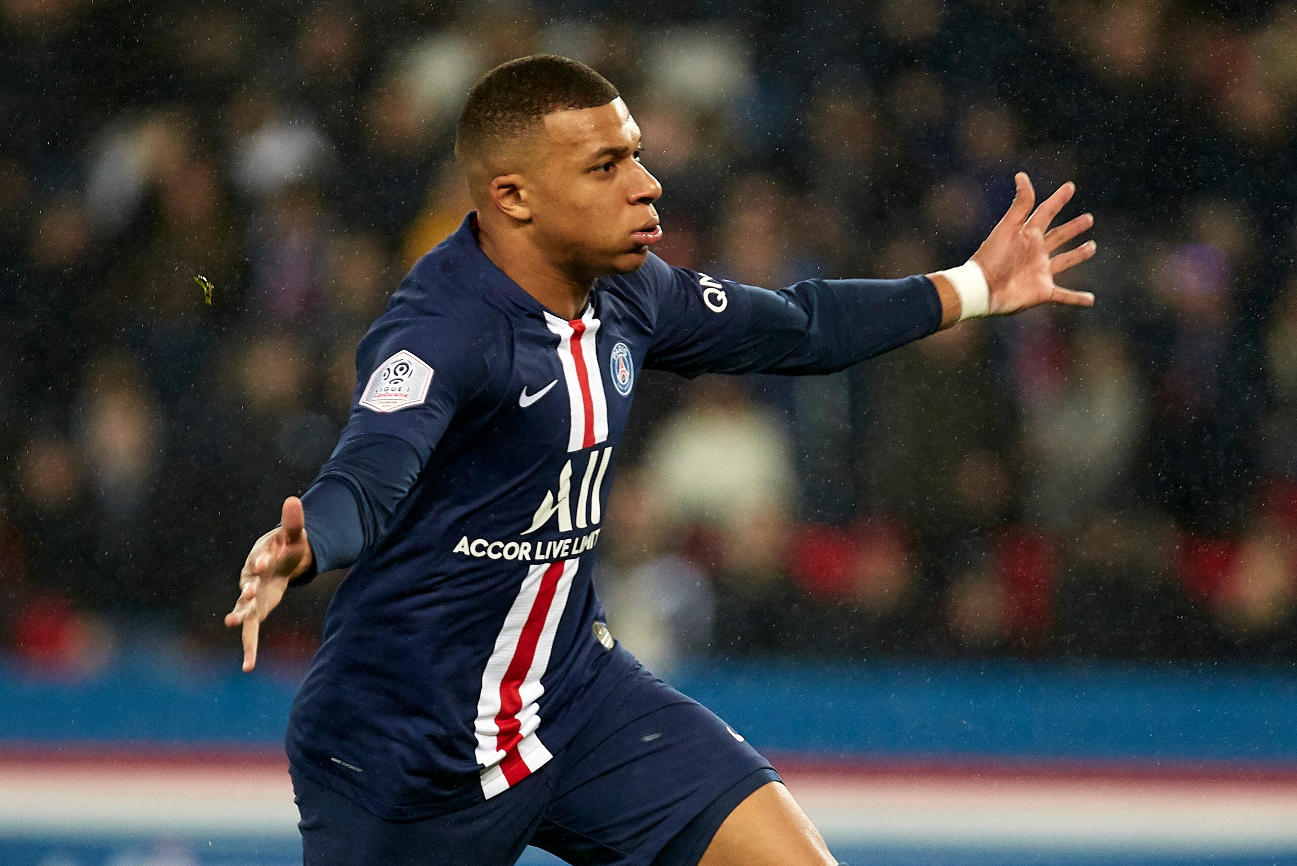 PARIS, FRANCE - FEBRUARY 09: Kylian Mbappe of Paris Saint-Germain celebrates after scoring his team's second goal during the Ligue 1 match between Paris Saint-Germain and Olympique Lyon at Parc des Princes on February 09, 2020 in Paris, France. (Photo by PARIS, FRANCE - FEBRUARY 09: Kylian Mbappe of Paris Saint-Germain celebrates after scoring his team's second goal during the Ligue 1 match between Paris Saint-Germain and Olympique Lyon at Parc des Princes on February 09, 2020 in Paris, France. (Photo by