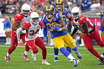 LOS ANGELES, CA - DECEMBER 29: Strong safety Jalen Thompson #34 and linebacker Chandler Jones #55 of the Arizona Cardinals chase townTodd Gurley #30 of the Los Angeles Rams as he runs the ball in the game at the Los Angeles Memorial Coliseum on December 2