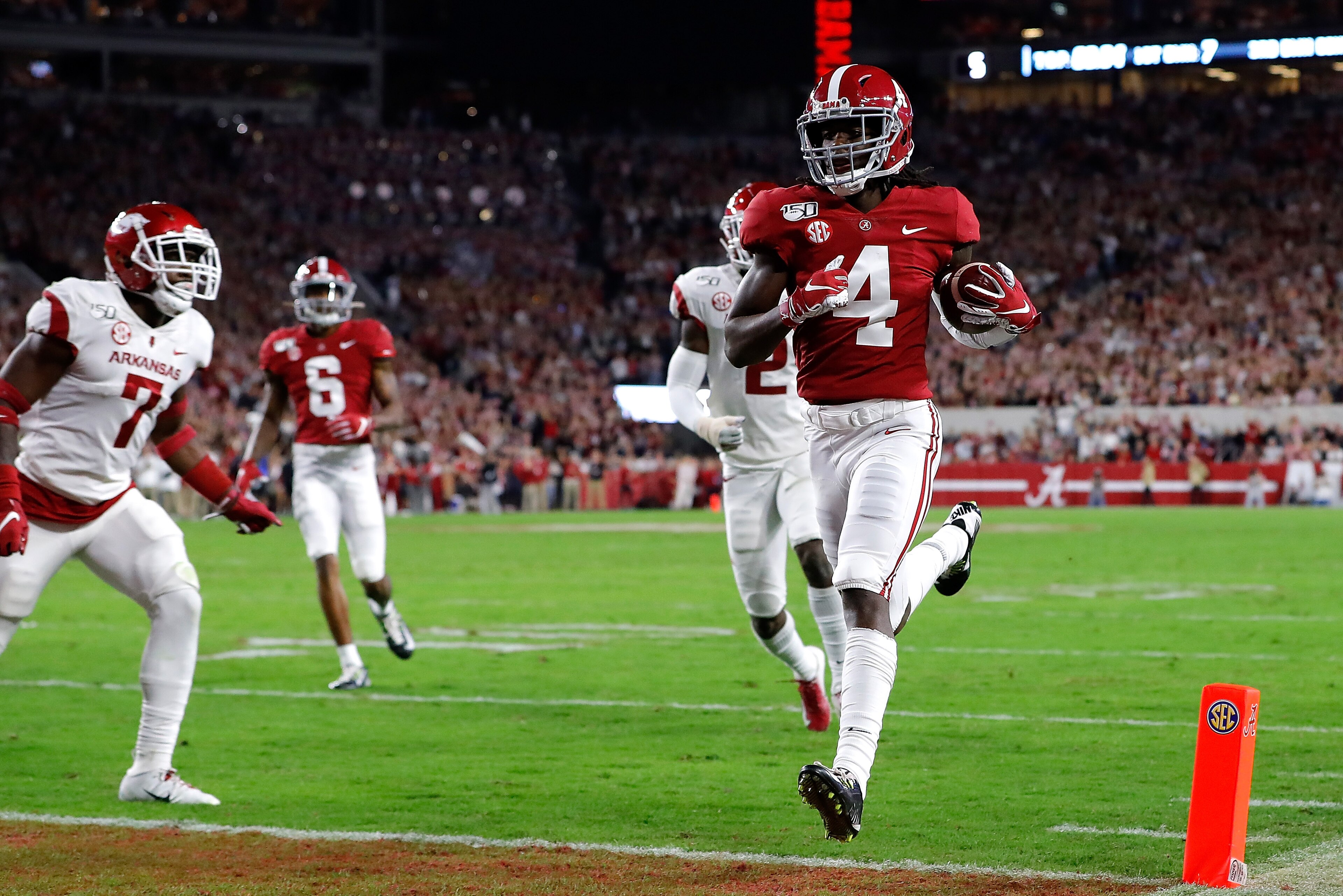 TUSCALOOSA, ALABAMA - OCTOBER 26: Jerry Jeudy #4 of the Alabama Crimson Tide carries this reception in for a touchdown in the first half against the Arkansas Razorbacks at Bryant-Denny Stadium on October 26, 2019 in Tuscaloosa, Alabama. (Photo by Kevin C TUSCALOOSA, ALABAMA - OCTOBER 26: Jerry Jeudy #4 of the Alabama Crimson Tide carries this reception in for a touchdown in the first half against the Arkansas Razorbacks at Bryant-Denny Stadium on October 26, 2019 in Tuscaloosa, Alabama. (Photo by Kevin C
