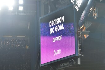 The big screen displays the decision after a VAR (Video Assistant Referee) review, disallowing a goal from Chelsea's French striker Olivier Giroud for offside during the English Premier League football match between Chelsea and Manchester United at Stamfo