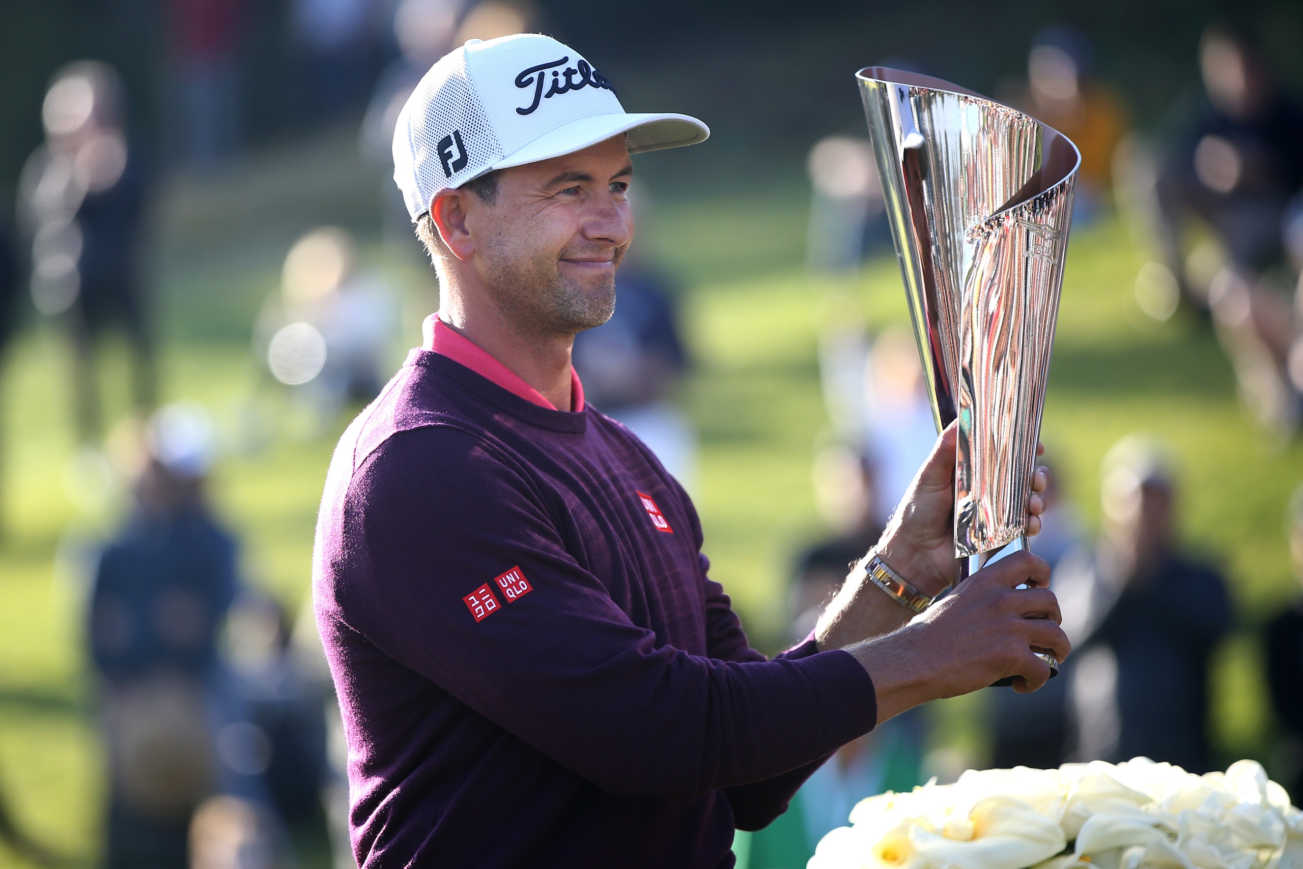 PACIFIC PALISADES, CALIFORNIA - FEBRUARY 16: Adam Scott of Australia holds the trophy following the final round of the Genesis Invitational at the Riviera Country Club on February 16, 2020 in Pacific Palisades, California. (Photo by Katharine Lotze/Getty 