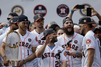 HOUSTON, TX - NOVEMBER 03:  George Springer #4 of the Houston Astros is introduced during the Houston Astros Victory Parade on November 3, 2017 in Houston, Texas.  The Astros defeated the Los Angeles Dodgers 5-1 in Game 7 to win the 2017 World Series.  (P