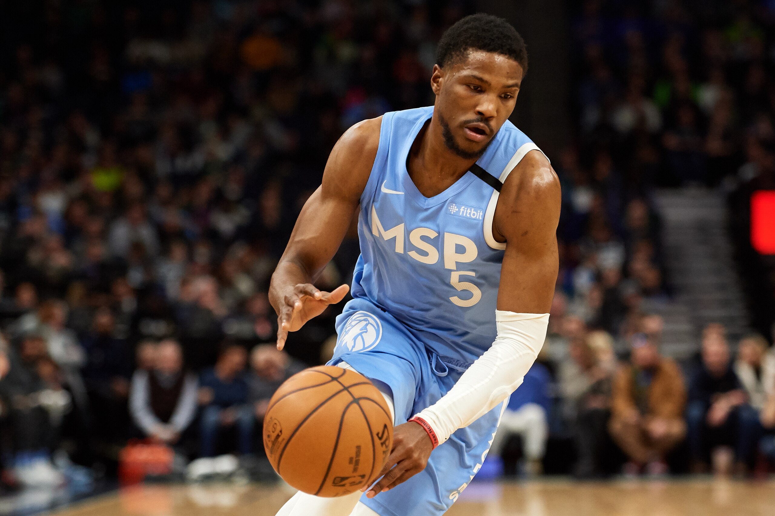 MINNEAPOLIS, MINNESOTA - FEBRUARY 21: Malik Beasley #5 of the Minnesota Timberwolves dribbles the ball against the Boston Celtics during the game at Target Center on February 21, 2020 in Minneapolis, Minnesota. NOTE TO USER: User expressly acknowledges an