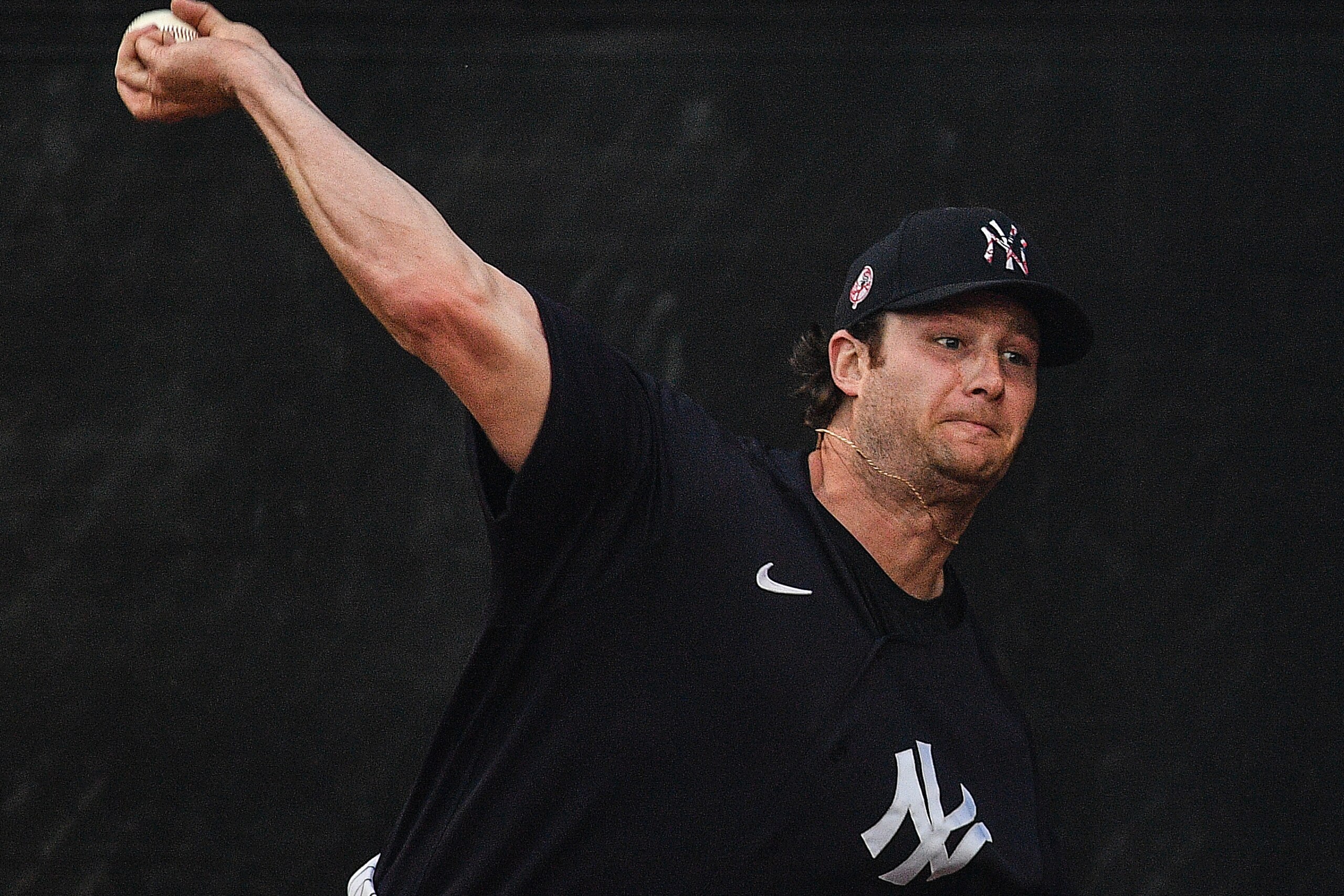 TAMPA, FLORIDA - FEBRUARY 24: Gerrit Cole #45 of the New York Yankees warms up in the bullpen before the spring training game against the Pittsburgh Pirates at Steinbrenner Field on February 24, 2020 in Tampa, Florida. (Photo by Mark Brown/Getty Images)