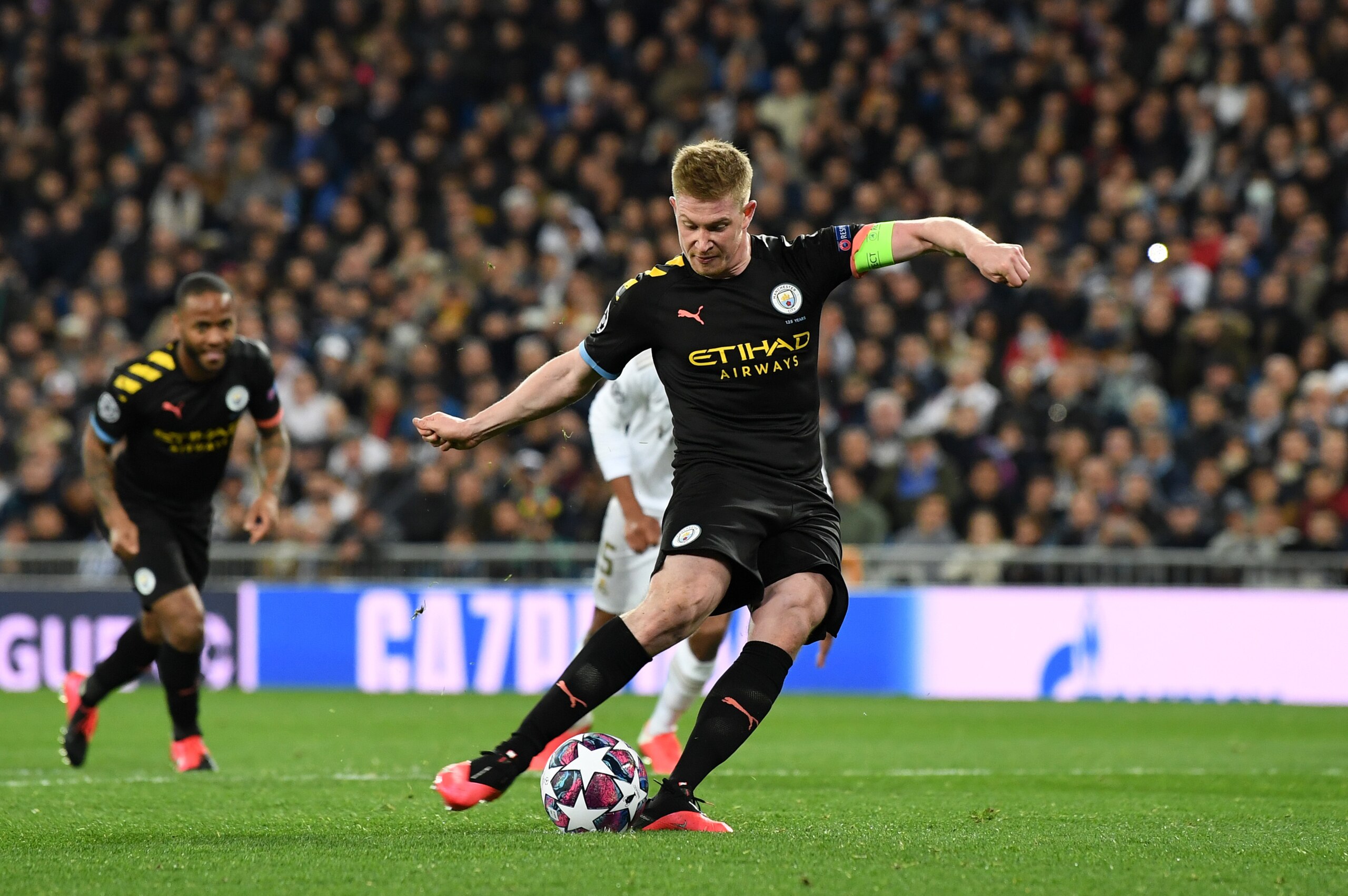 MADRID, SPAIN - FEBRUARY 26: Kevin De Bruyne of Manchester City scores a penalty for his team's second goal during the UEFA Champions League round of 16 first leg match between Real Madrid and Manchester City at Bernabeu on February 26, 2020 in Madrid, Sp