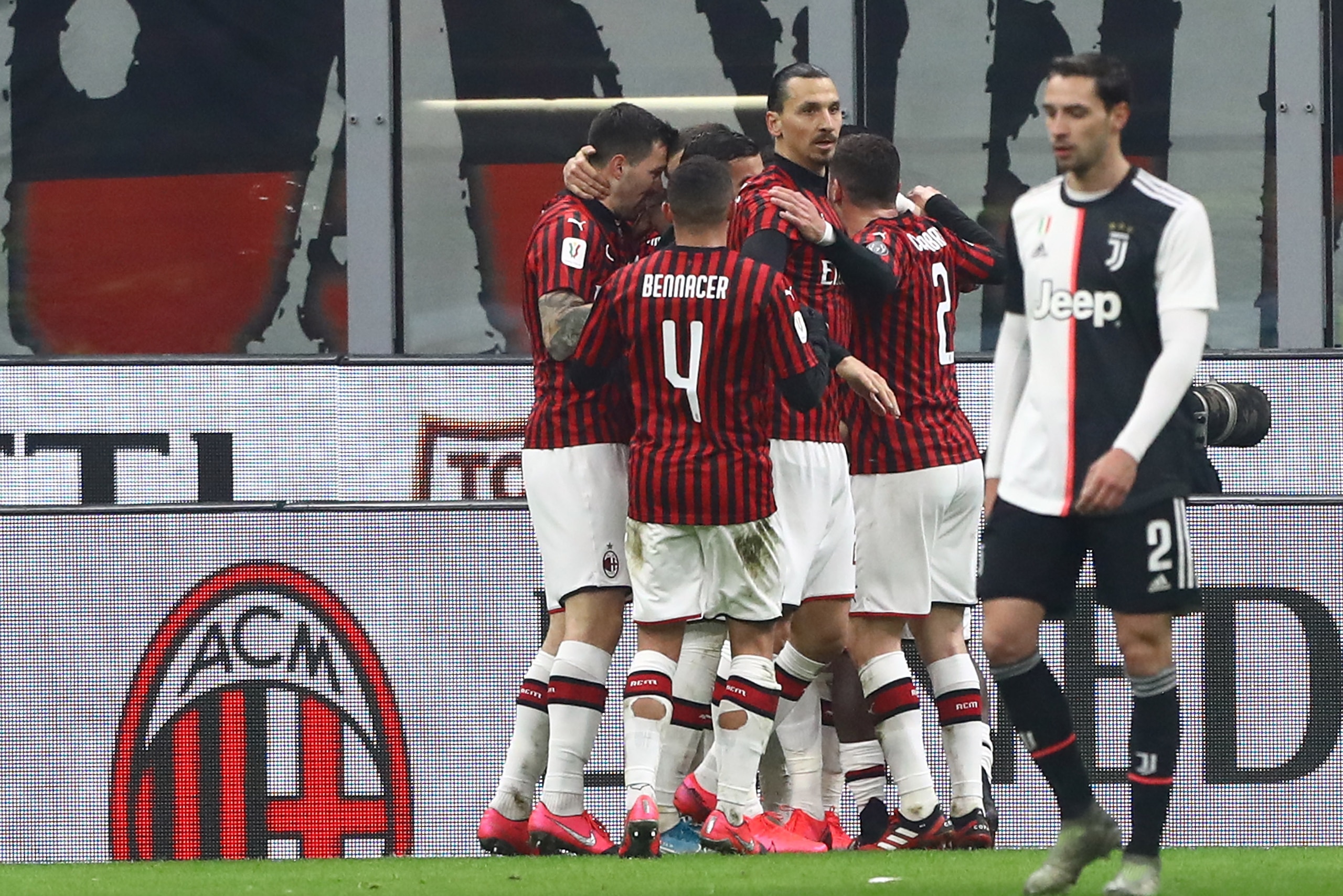 MILAN, ITALY - FEBRUARY 13:  Ante Rebic of AC Milan celebrates with his team-mates after scoring the opening goal during the Coppa Italia Semi Final match between AC Milan and Juventus at Stadio Giuseppe Meazza on February 13, 2020 in Milan, Italy.  (Phot