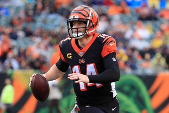 CINCINNATI, OHIO - DECEMBER 29:   Andy Dalton #14 of the Cincinnati Bengals runs for a touchdown during the game against the Cleveland Browns at Paul Brown Stadium on December 29, 2019 in Cincinnati, Ohio. (Photo by Andy Lyons/Getty Images)