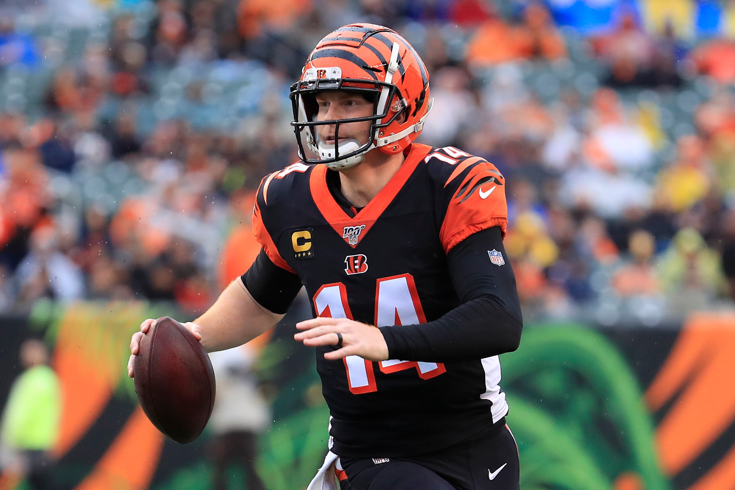 CINCINNATI, OHIO - DECEMBER 29:   Andy Dalton #14 of the Cincinnati Bengals runs for a touchdown during the game against the Cleveland Browns at Paul Brown Stadium on December 29, 2019 in Cincinnati, Ohio. (Photo by Andy Lyons/Getty Images)