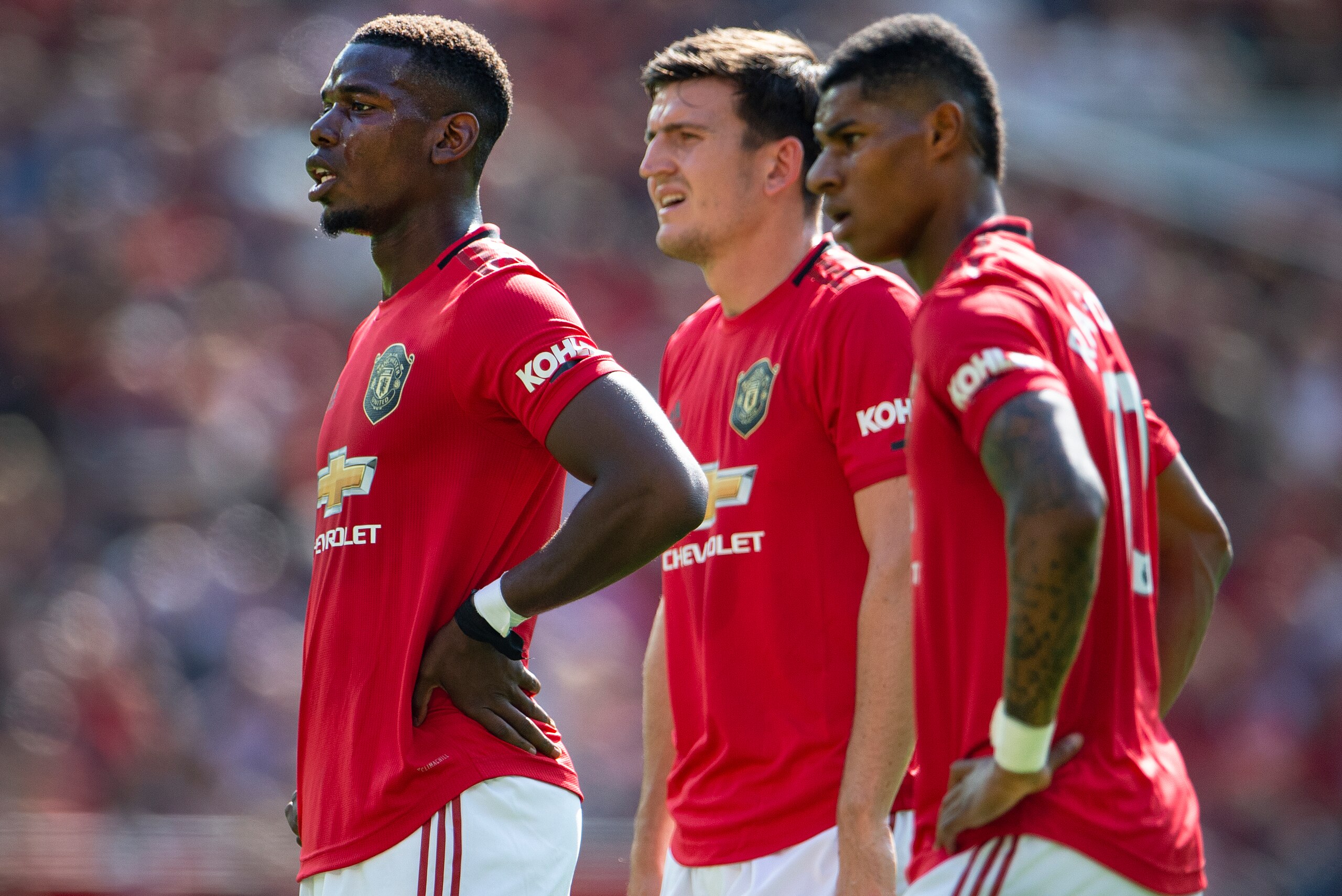 MANCHESTER, ENGLAND - AUGUST 24: Paul Pogba, Harry Maguire and Marcus Rashford of Manchester United during the Premier League match between Manchester United and Crystal Palace at Old Trafford on August 24, 2019 in Manchester, United Kingdom. (Photo by Vi
