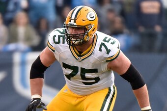 NASHVILLE, TN - NOVEMBER 13:  Bryan Bulaga #75 of the Green Bay Packers plays against the Tennessee Titans at Nissan Stadium on November 13, 2016 in Nashville, Tennessee.  (Photo by Frederick Breedon/Getty Images)