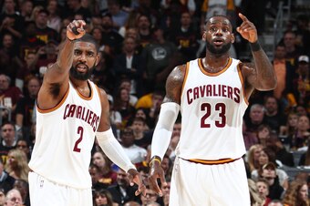 CLEVELAND, OH - JUNE 7:  Kyrie Irving #2 and LeBron James #23 of the Cleveland Cavaliers looks on during the game against the Golden State Warriors in Game Three of the 2017 NBA Finals on June 7, 2017 at Quicken Loans Arena in Cleveland, Ohio. NOTE TO USE
