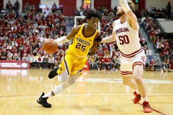 BLOOMINGTON, INDIANA - MARCH 04: Daniel Oturu #25 of the Minnesota Golden Gophers drives to the basket while being guarded by Joey Brunk #50 of the Indiana Hoosiers at Assembly Hall on March 04, 2020 in Bloomington, Indiana. (Photo by Justin Casterline/Ge