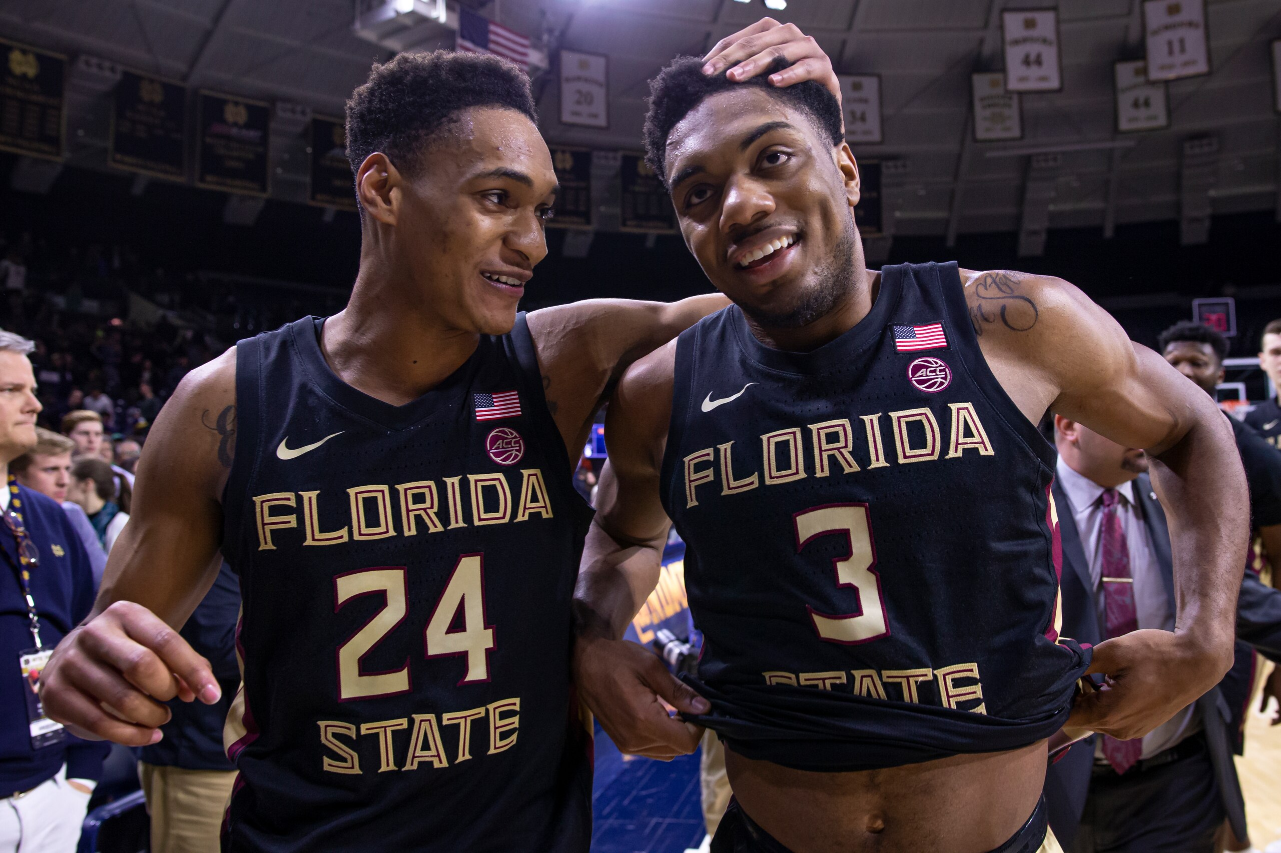 SOUTH BEND, IN - MARCH 04: Devin Vassell #24 and Trent Forrest #3 of the Florida State Seminoles walk off the court after their come from behind win over the Notre Dame Fighting Irish at Purcell Pavilion on March 4, 2020 in South Bend, Indiana. (Photo by 