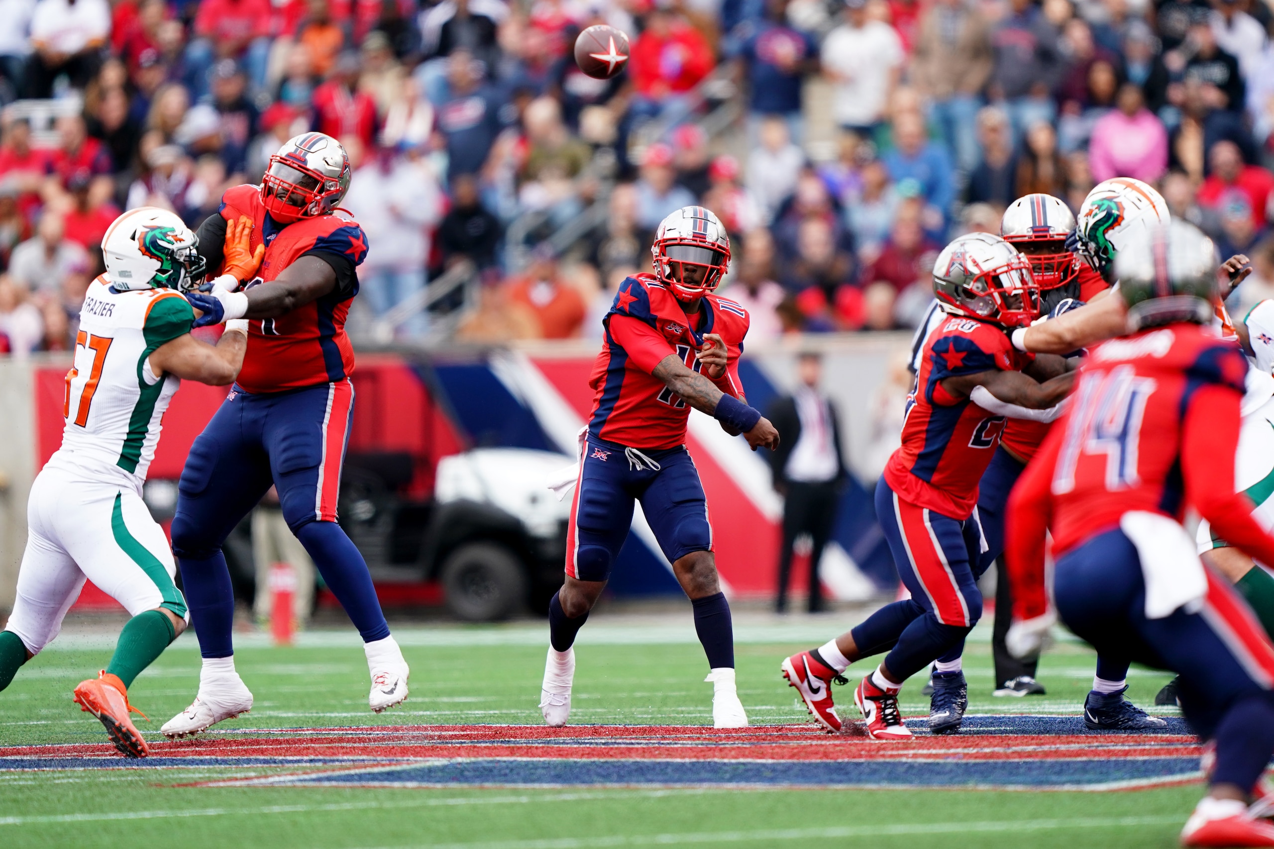 HOUSTON, TX - MARCH 7:  P.J. Walker #11 of the Houston Roughnecks passing during the XFL game against the Seattle Dragons at TDECU Stadium on March 7, 2020 in Houston, Texas. (Photo by Eddie Clarke/XFL via Getty Images)