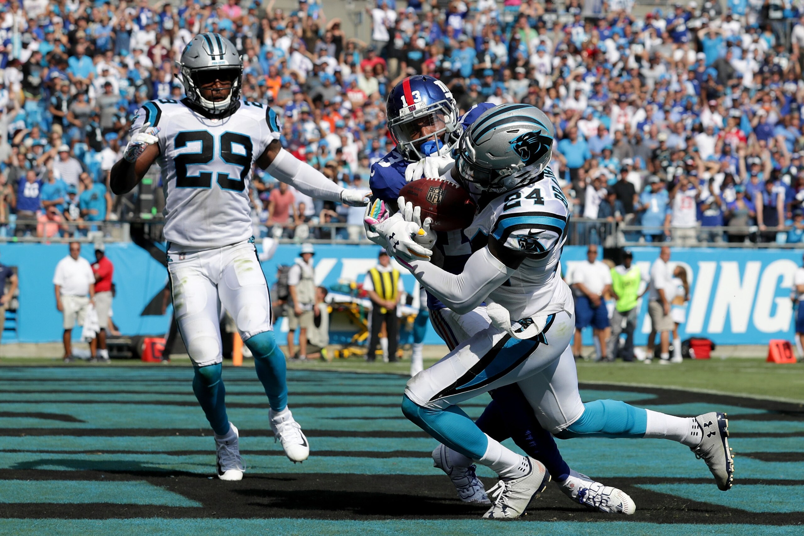 CHARLOTTE, NC - OCTOBER 07: James Bradberry #24 of the Carolina Panthers defends a pass to Odell Beckham #13 of the New York Giants in the third quarter during their game at Bank of America Stadium on October 7, 2018 in Charlotte, North Carolina. (Photo CHARLOTTE, NC - OCTOBER 07: James Bradberry #24 of the Carolina Panthers defends a pass to Odell Beckham #13 of the New York Giants in the third quarter during their game at Bank of America Stadium on October 7, 2018 in Charlotte, North Carolina. (Photo