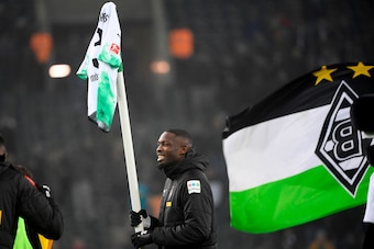 Moenchengladbach's French forward Marcus Thuram celebrates their victory at the end of the German first division Bundesliga football match Borussia Moenchengladbach v Mainz 05 in Moenchengladbach on January 25, 2020. (Photo by INA FASSBENDER / AFP) / DFL 