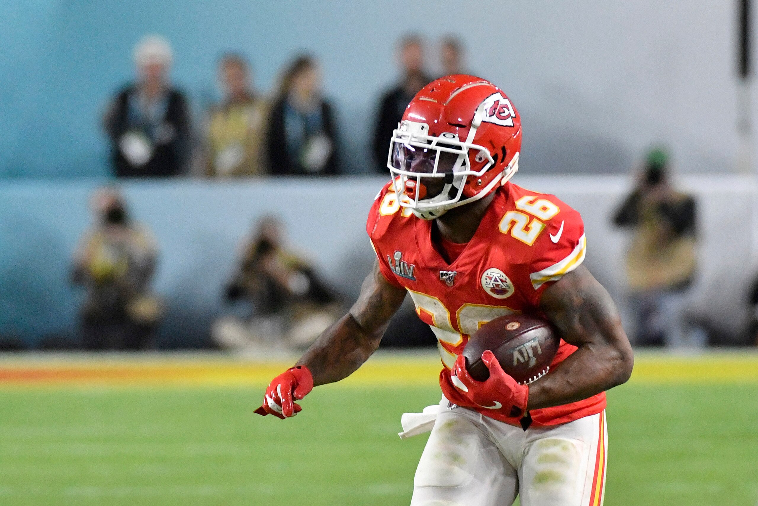 MIAMI, FLORIDA - FEBRUARY 02: Damien Williams #26 of the Kansas City Chiefs carries the ball against the San Francisco 49ers in Super Bowl LIV at Hard Rock Stadium on February 02, 2020 in Miami, Florida. The Chiefs won the game 31-20. (Photo by Focus on S MIAMI, FLORIDA - FEBRUARY 02: Damien Williams #26 of the Kansas City Chiefs carries the ball against the San Francisco 49ers in Super Bowl LIV at Hard Rock Stadium on February 02, 2020 in Miami, Florida. The Chiefs won the game 31-20. (Photo by Focus on S